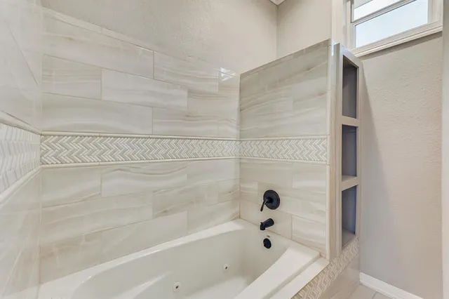 a bathroom with a bathtub