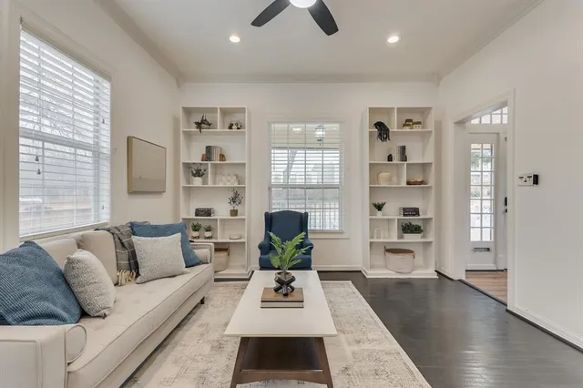 a living room with furniture and a rug