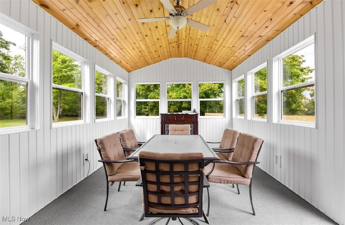 6061 Phillips Rice Road Cortland, OH 44410 - Photo 15 of 34 Sunroom / solarium featuring lofted ceiling, plenty of natural light, ceiling fan, and wood ceiling