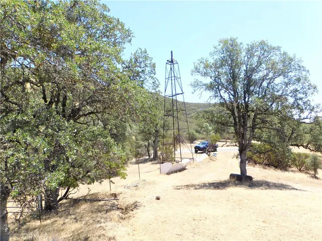 a view of a yard covered in snow