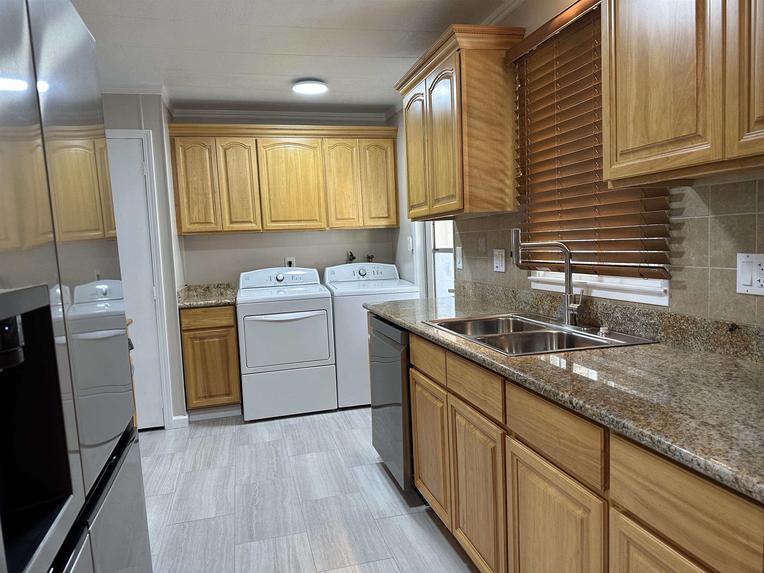 711 Old Canyon Road, Unit 56 Fremont, CA 94536 - Photo 18 of 42 a kitchen with a sink stove and refrigerator