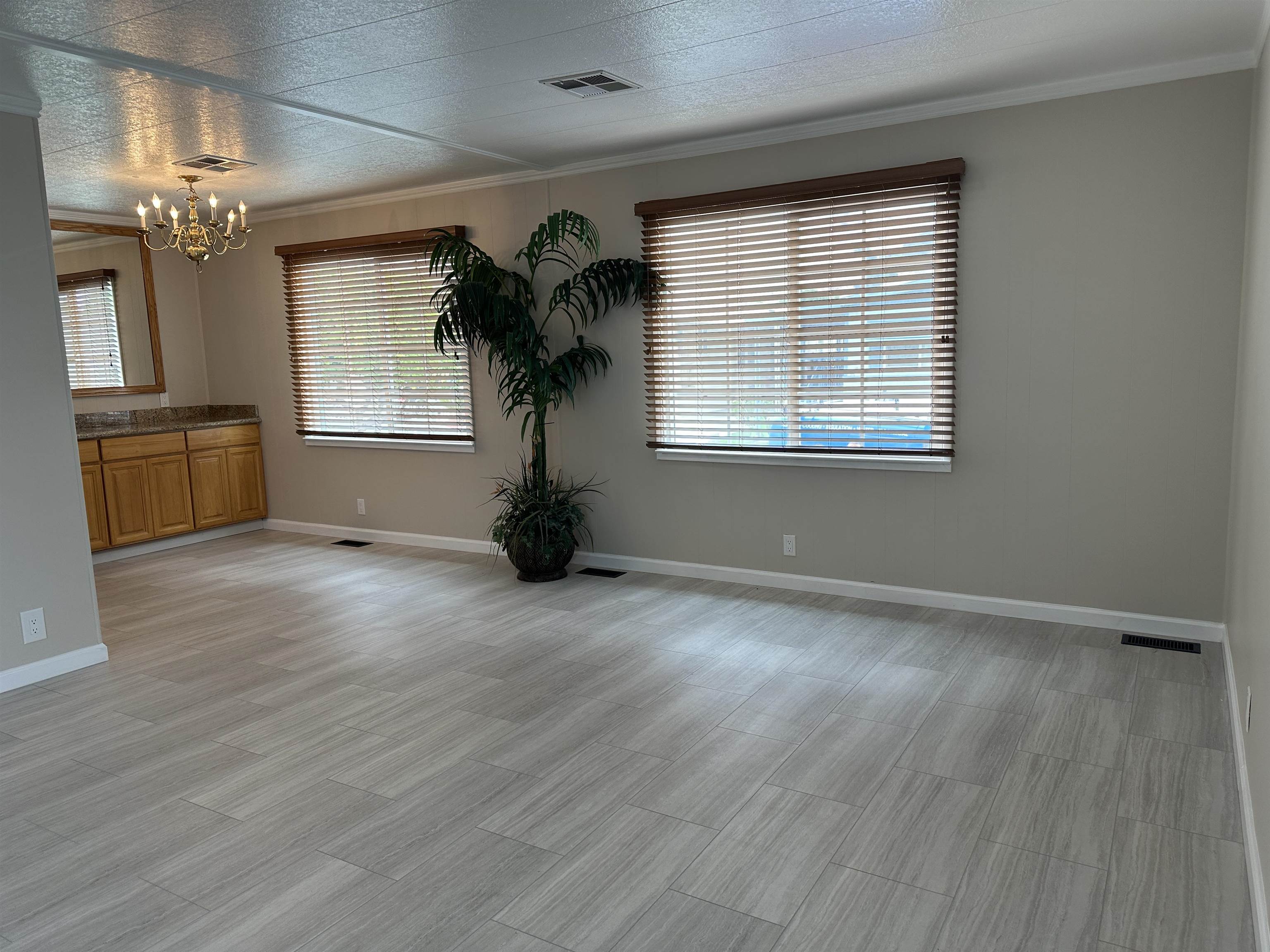711 Old Canyon Road, Unit 56 Fremont, CA 94536 - Photo 8 of 42 a view of empty room with wooden floor and fan