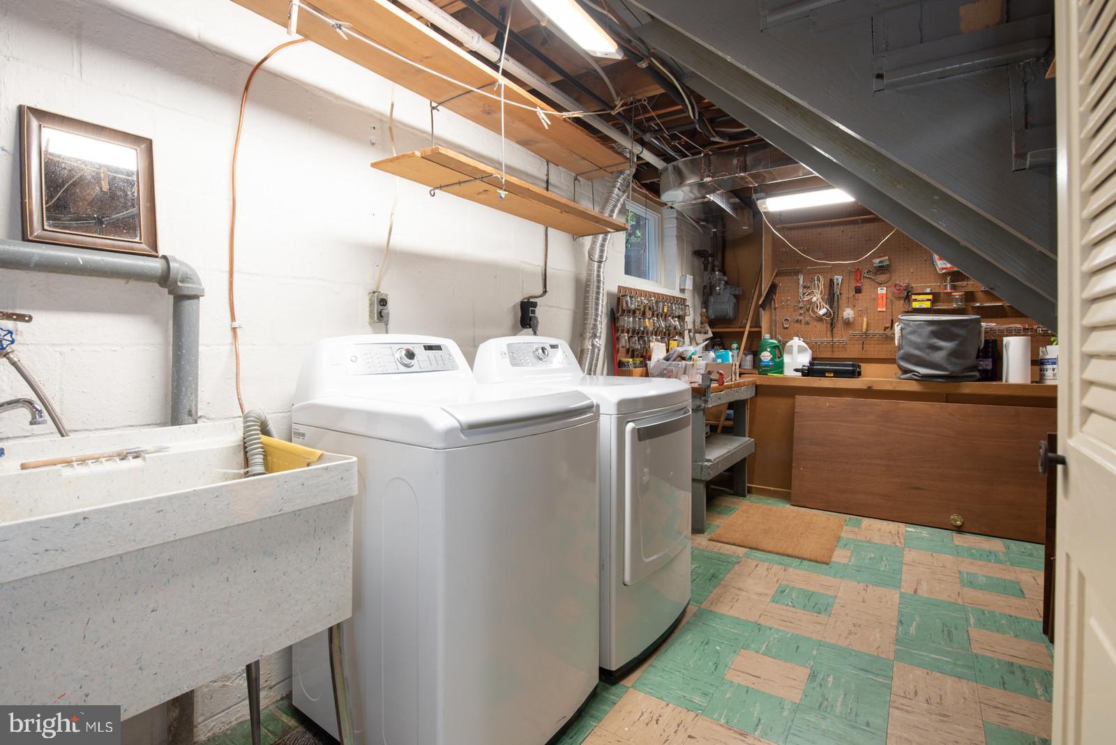 7923 New Market Road Alexandria, VA 22308 - Photo 33 of 42 Laundry and woodshop (contents convey)