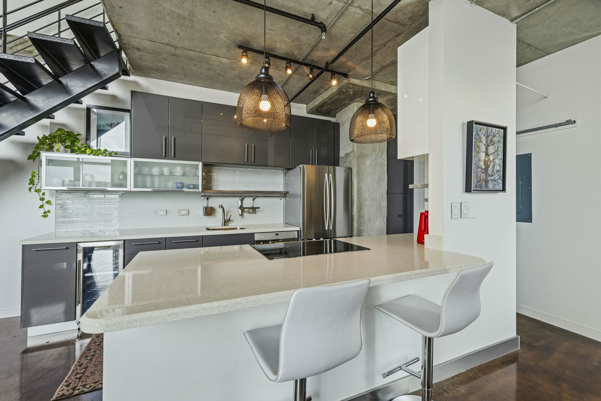 2000 Bagby Street, Unit 11415 Houston, TX 77002 - Photo 9 of 35 View of the kitchen from the dining area. Your guests can pull up a barstool at the breakfast bar for easy entertaining!