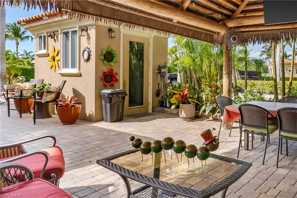 13446 Ladyfish Lane Naples, FL 34114 - Photo 14 of 44 a outdoor space with furniture