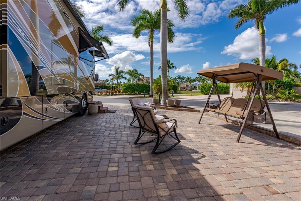 13446 Ladyfish Lane Naples, FL 34114 - Photo 26 of 44 a view of outdoor space deck kitchen and outdoor seating