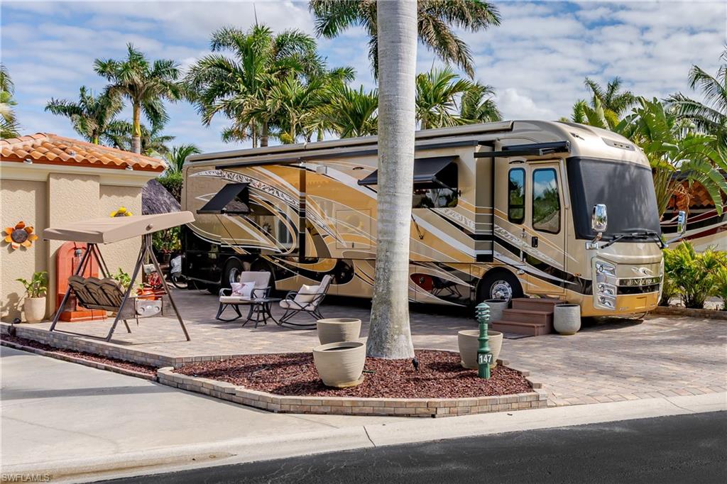 13446 Ladyfish Lane Naples, FL 34114 - Photo 33 of 44 a view of a house with entertaining space