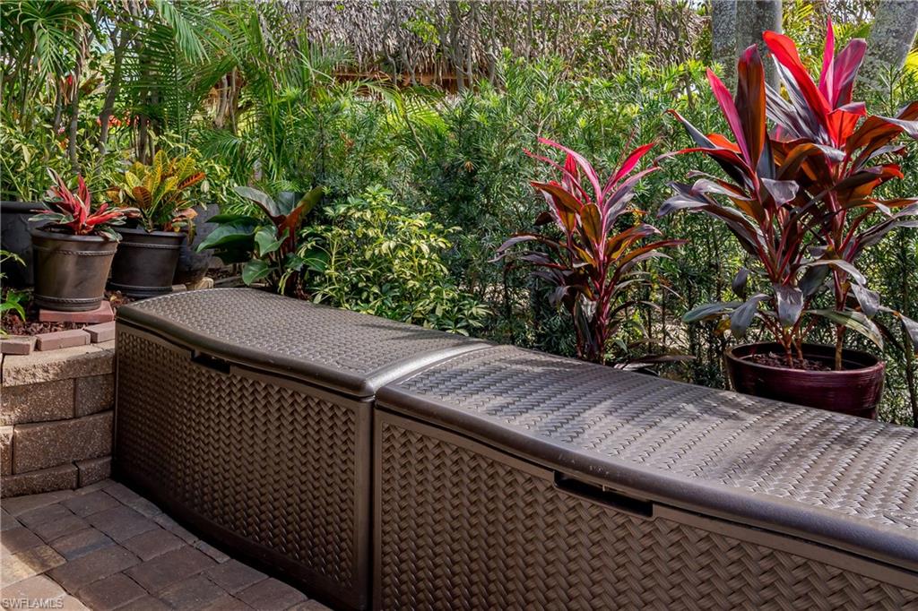 13446 Ladyfish Lane Naples, FL 34114 - Photo 6 of 44 a view of a backyard with sitting area