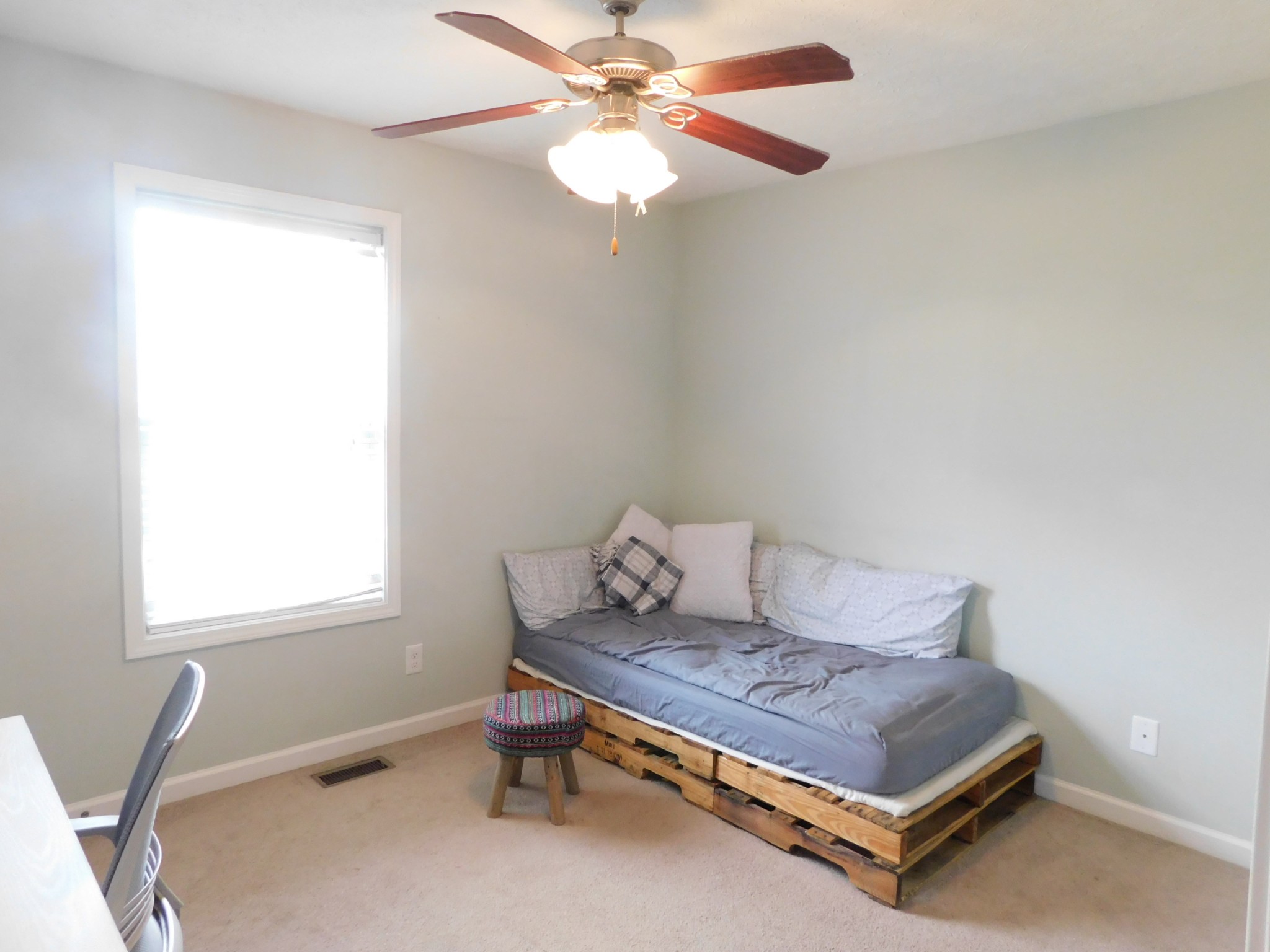 599 Jackson Road Portland, TN 37148 - Photo 23 of 39 a bedroom with a bed and window