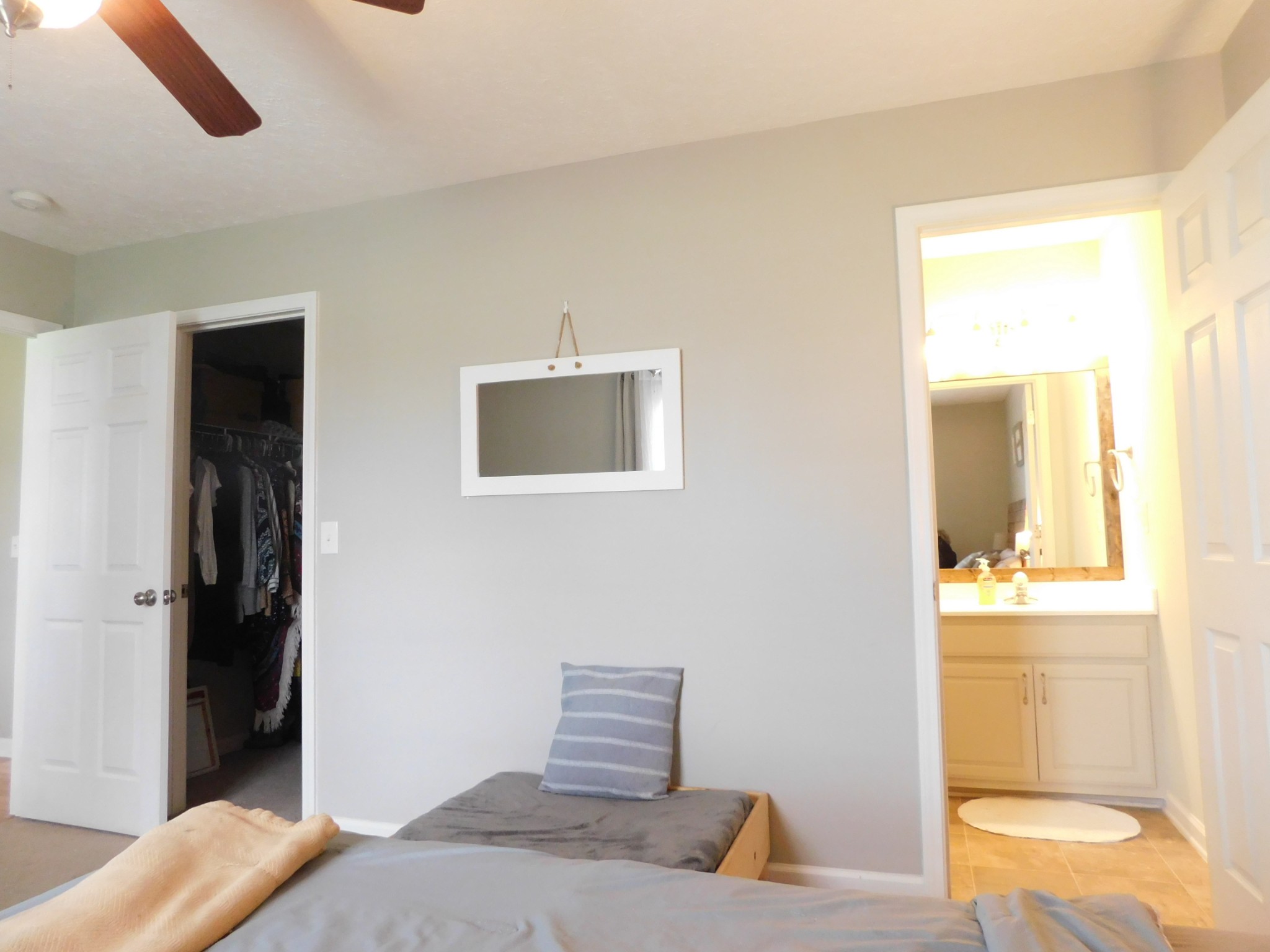 599 Jackson Road Portland, TN 37148 - Photo 28 of 39 a bedroom with a bed and wooden floor