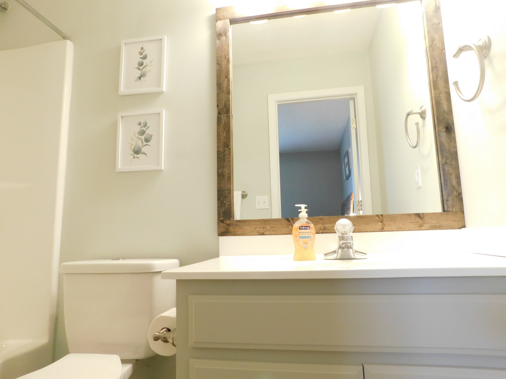 599 Jackson Road Portland, TN 37148 - Photo 32 of 39 a bathroom with a granite countertop sink mirror vanity and toilet