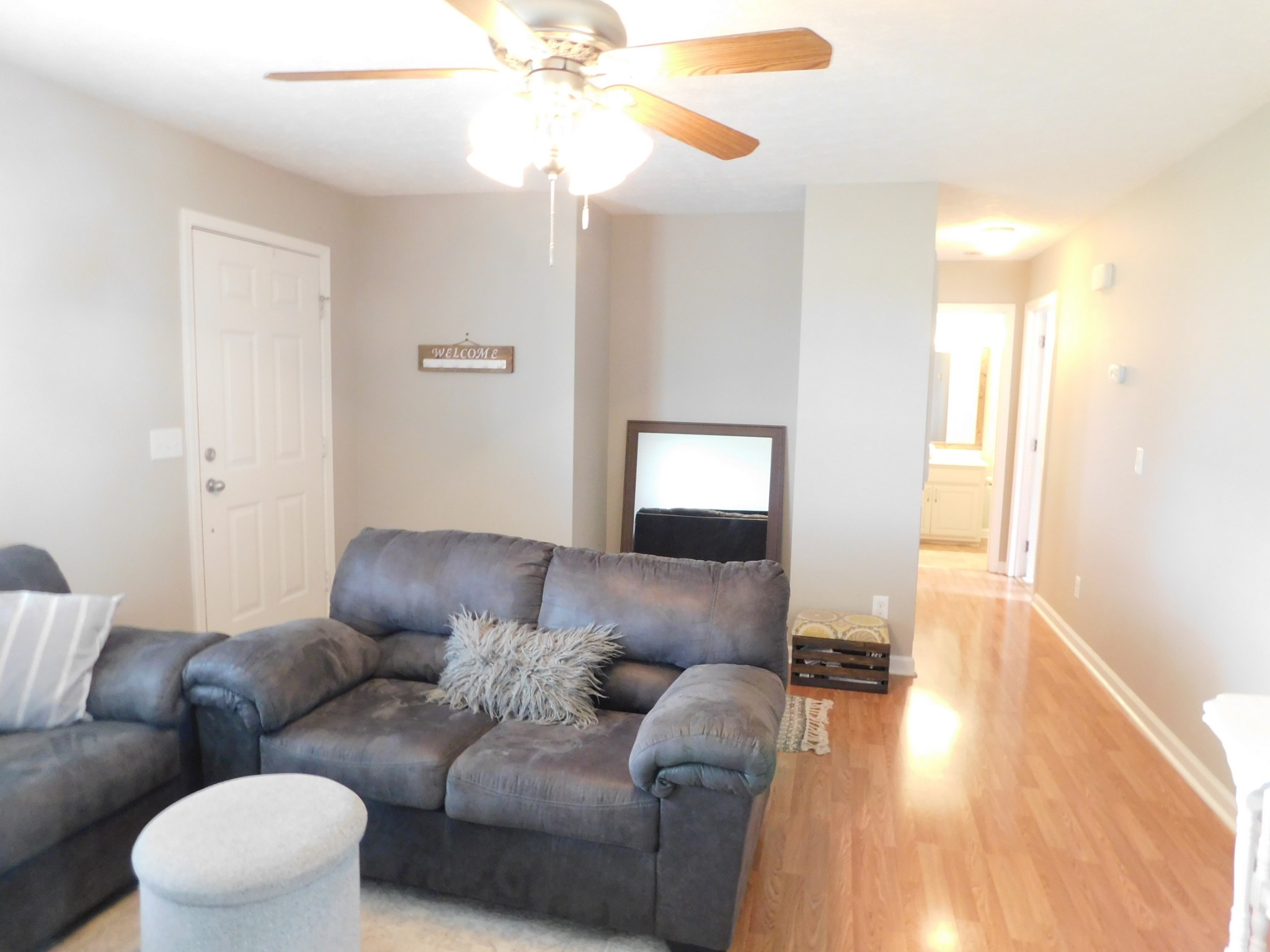 599 Jackson Road Portland, TN 37148 - Photo 6 of 39 a living room with furniture and a wooden floor