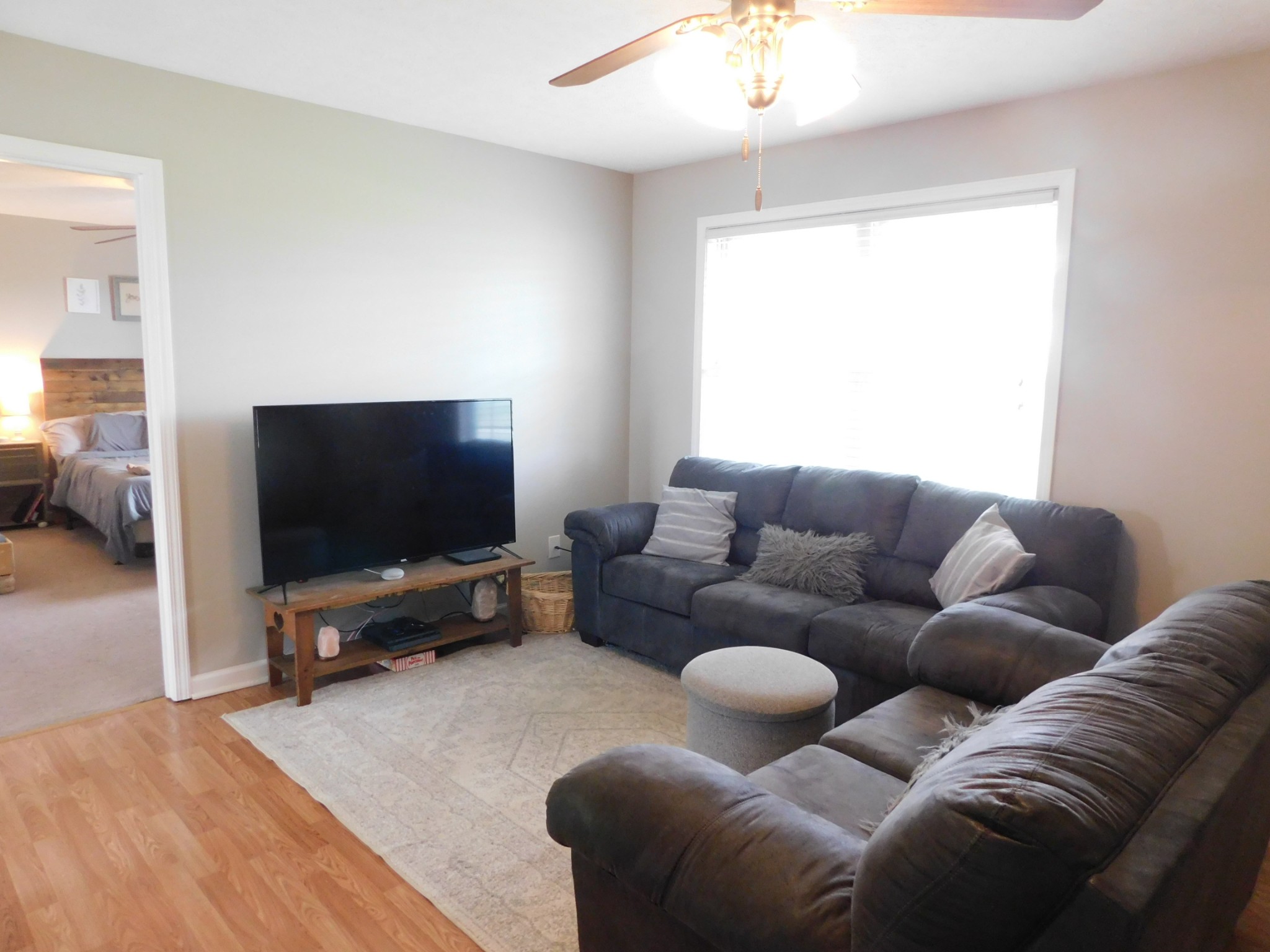 599 Jackson Road Portland, TN 37148 - Photo 7 of 39 a living room with furniture and a flat screen tv