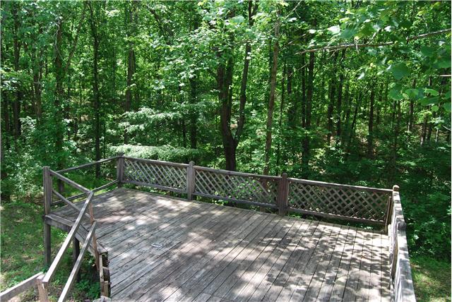 2899 Dodd Hollow Road Centerville, TN 37033 - Photo 1 of 20 Enjoy the shade and views from the deck surrounded by trees.