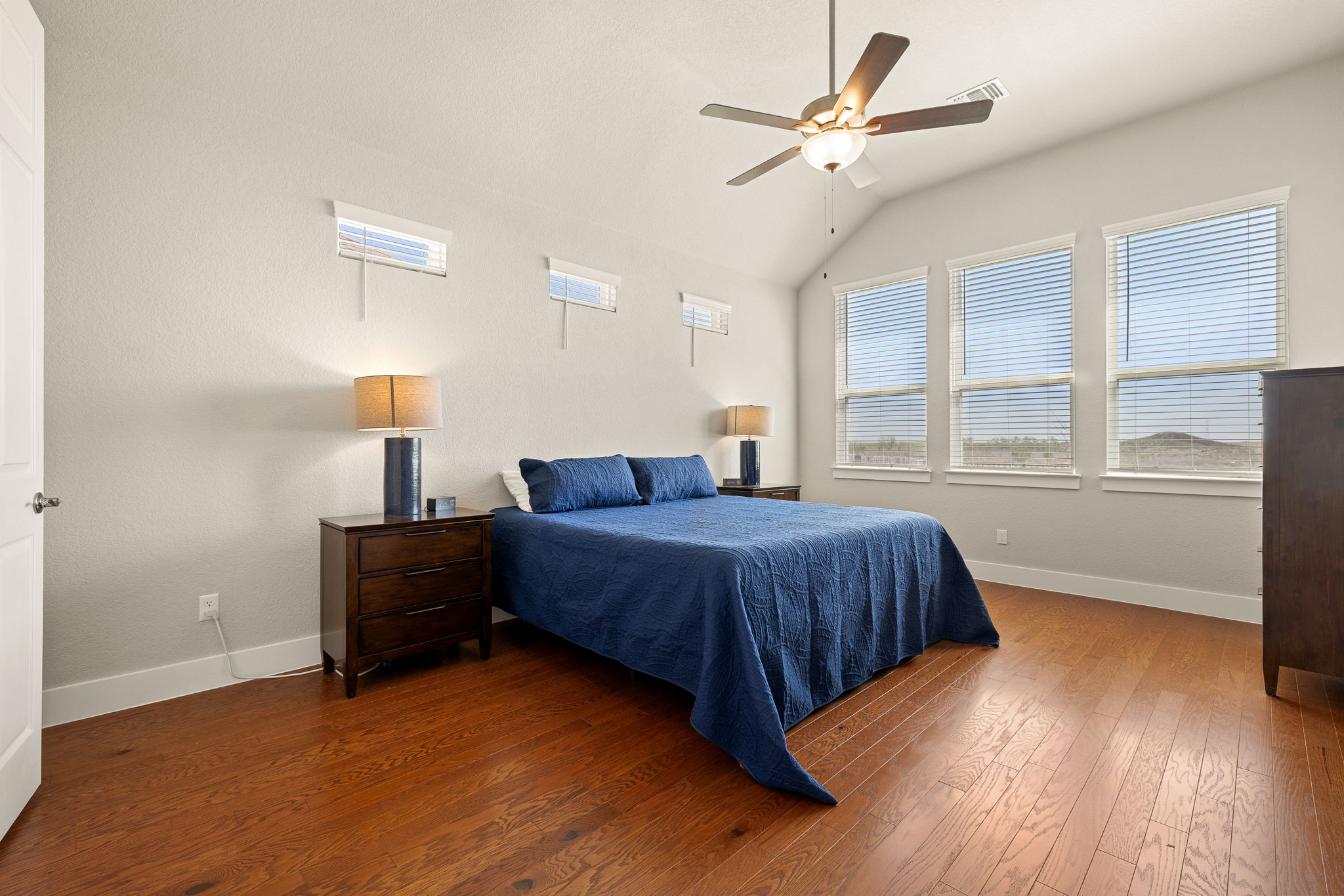 20409 Dustin Lane Pflugerville, TX 78660 - Photo 16 of 35 a bedroom with a bed and window