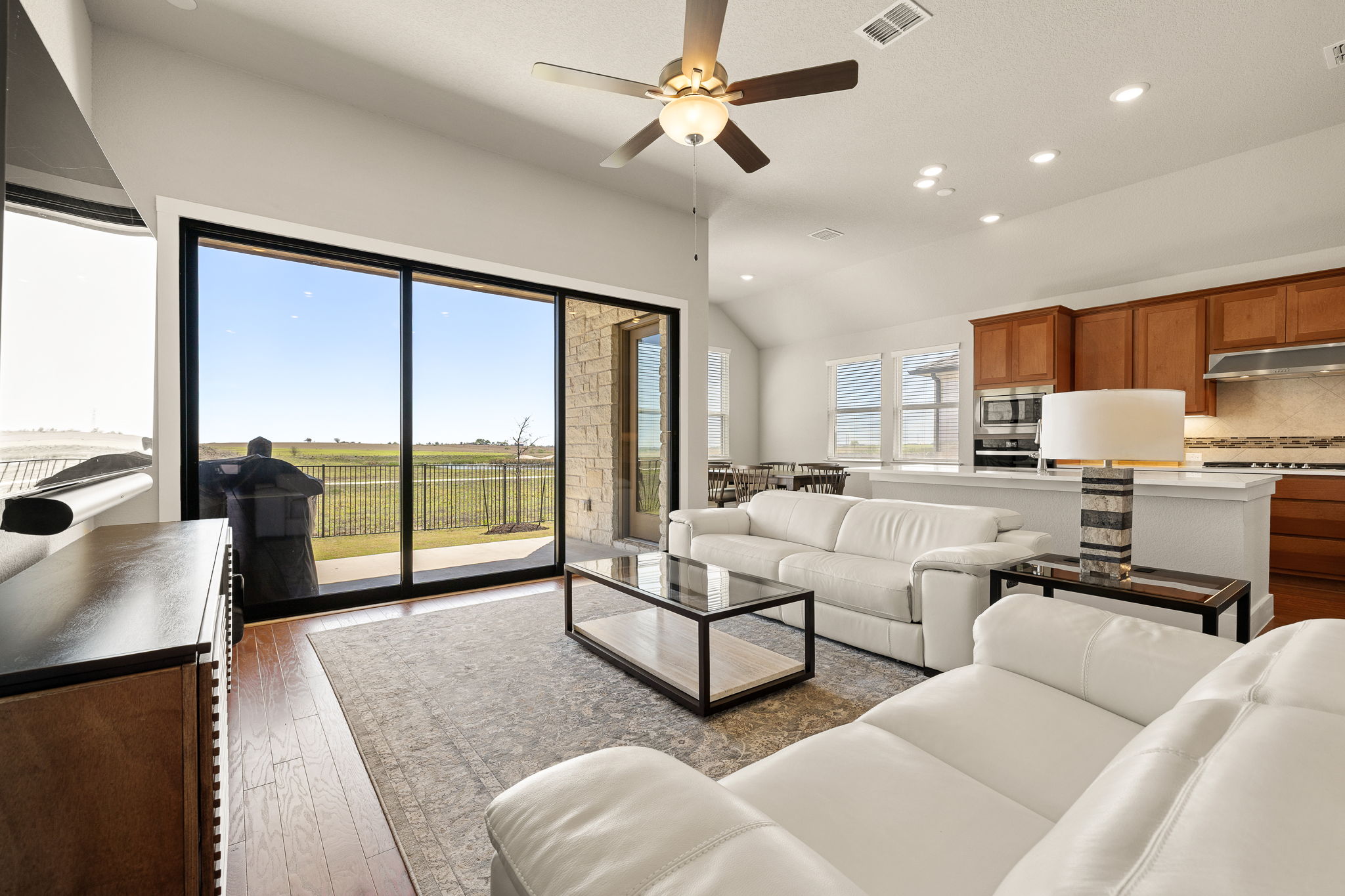 20409 Dustin Lane Pflugerville, TX 78660 - Photo 2 of 35 a living room with furniture and a large window