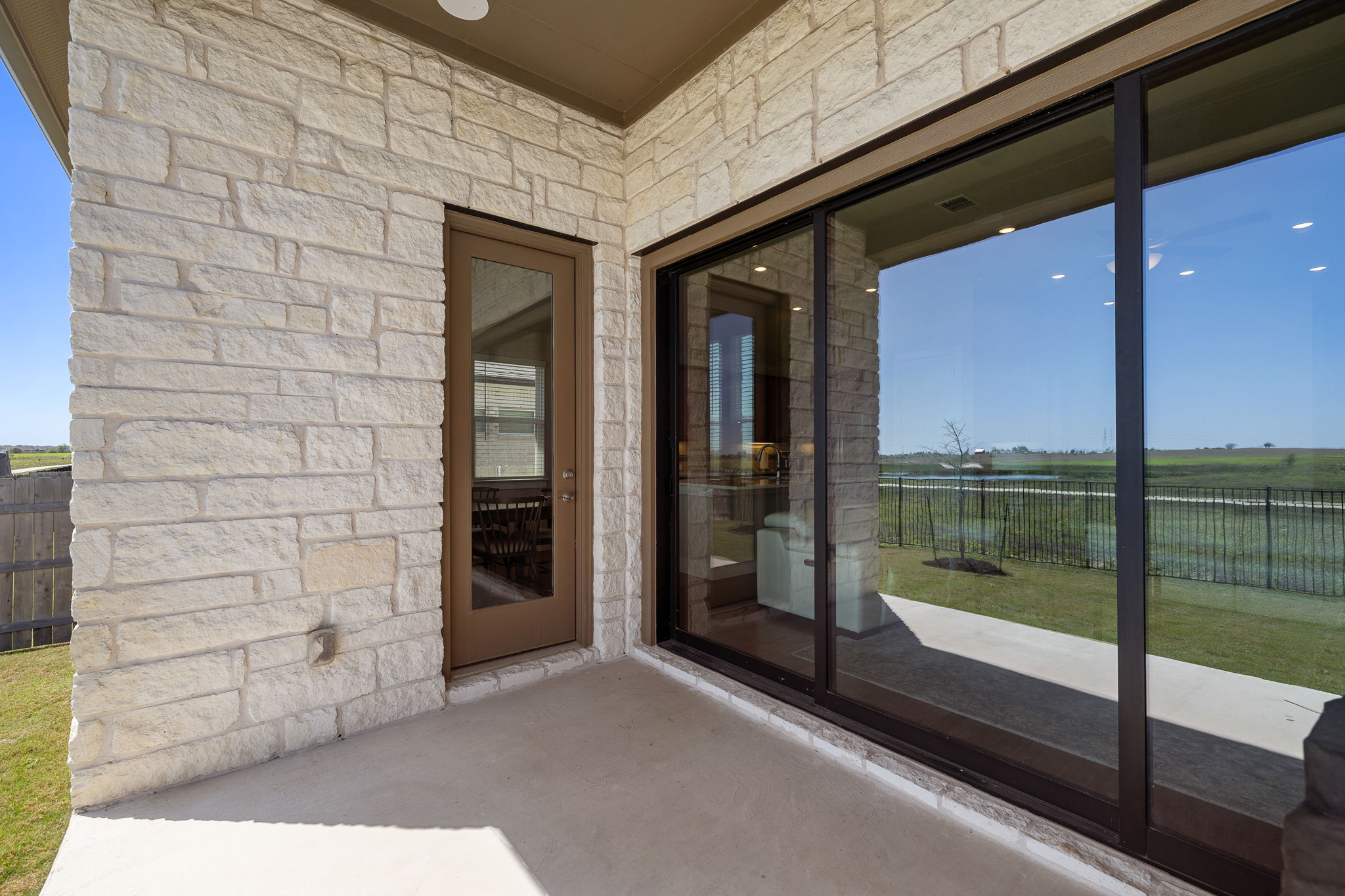 20409 Dustin Lane Pflugerville, TX 78660 - Photo 29 of 35 a view of a glass door of the house