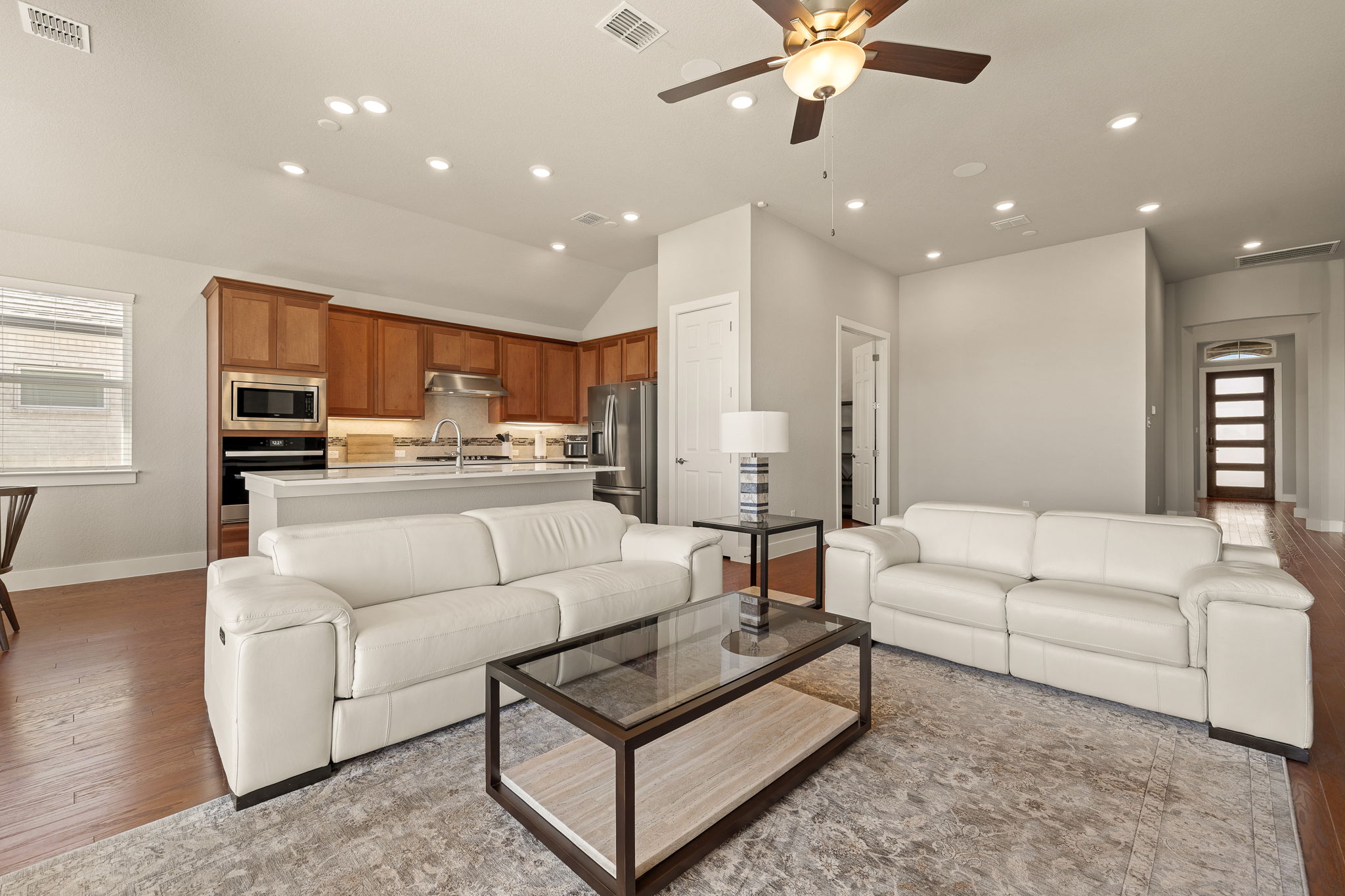 20409 Dustin Lane Pflugerville, TX 78660 - Photo 5 of 35 a living room with furniture and kitchen view