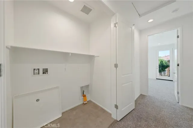 a bathroom with a double vanity sink toilet mirror and bathtub
