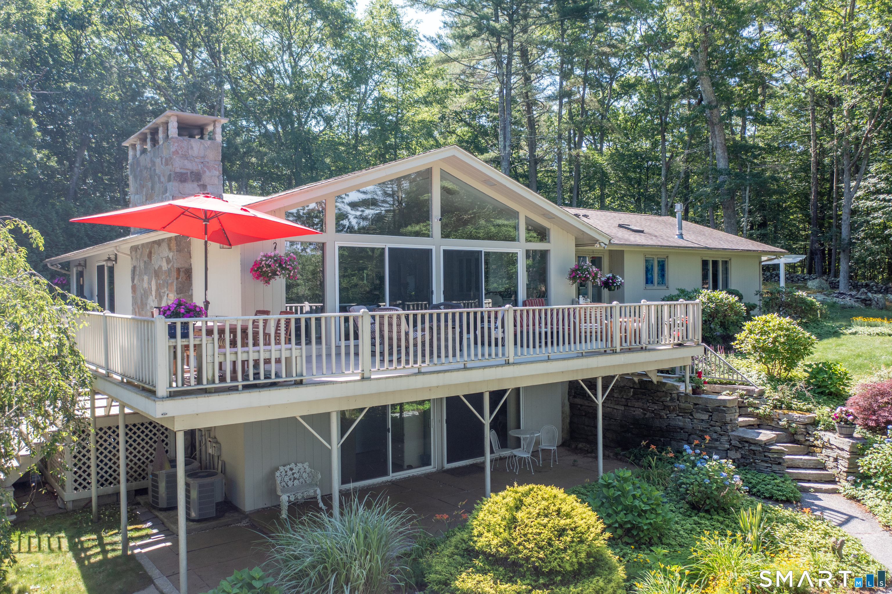 a balcony with furniture and garden
