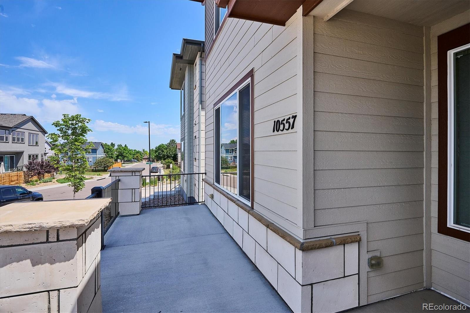 10557 Eby Circle Lone Tree, CO 80124 - Photo 2 of 50 a view of a terrace with couches and potted plants