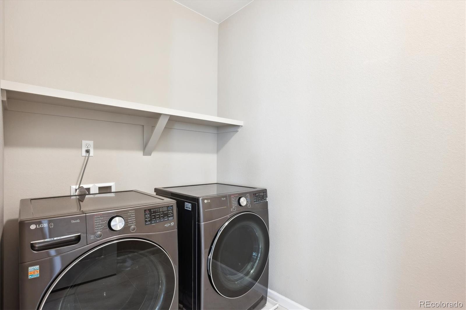10557 Eby Circle Lone Tree, CO 80124 - Photo 45 of 50 a utility room with dryer and washer