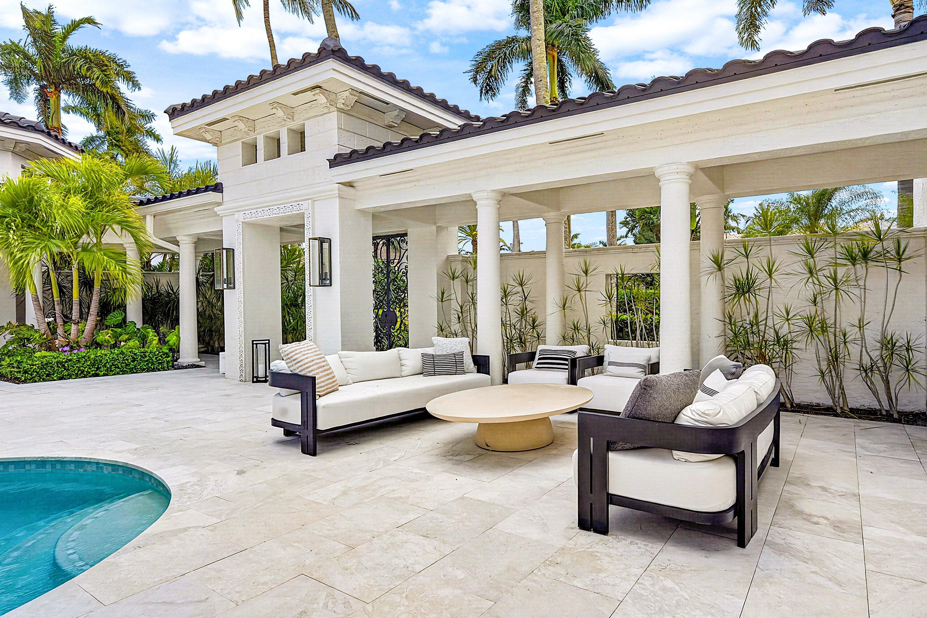 3633 Carlton Place Boca Raton, FL 33496 - Photo 12 of 99 a building outdoor space with patio furniture and potted plants