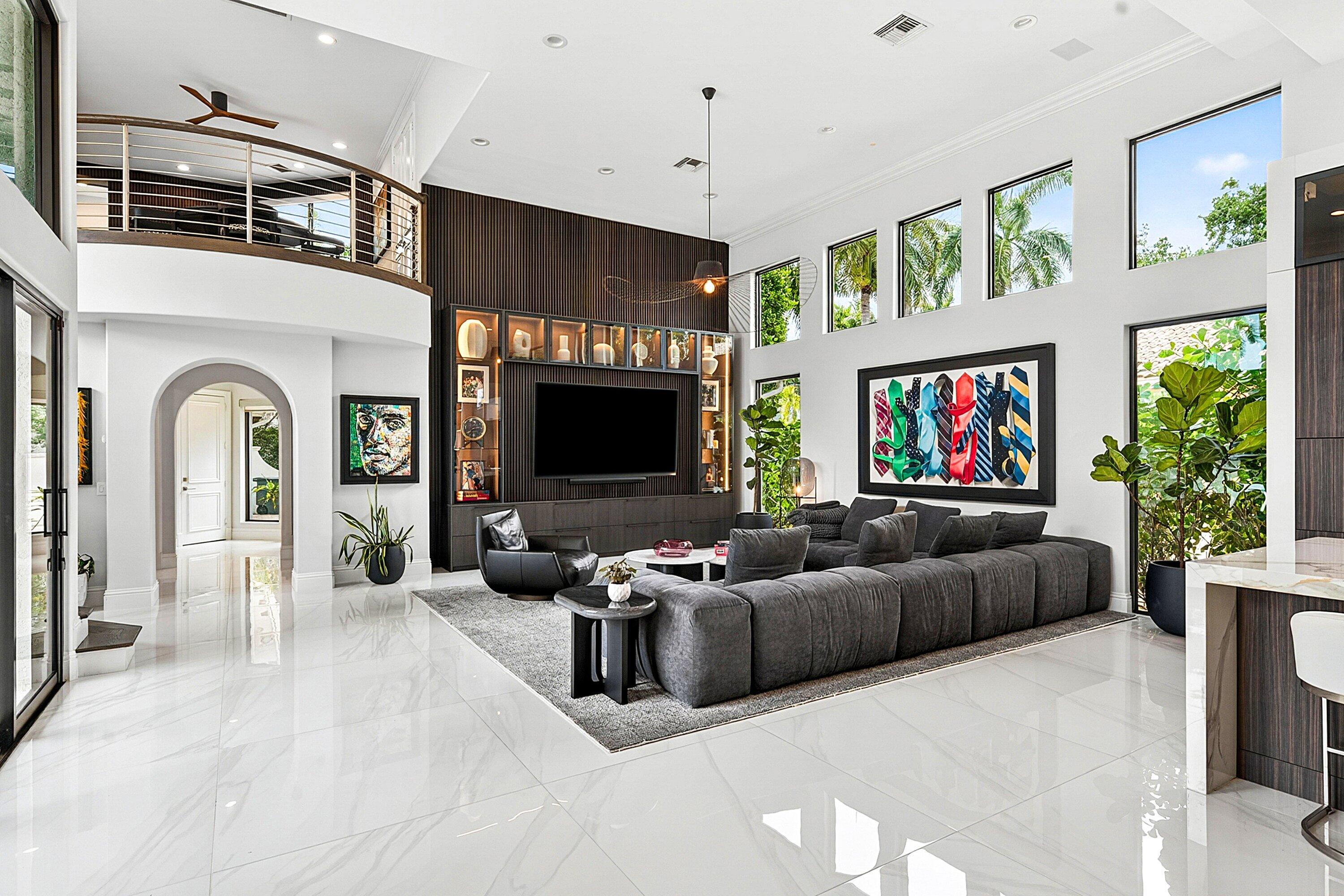 3633 Carlton Place Boca Raton, FL 33496 - Photo 20 of 99 a living room with furniture a flat screen tv and a fireplace