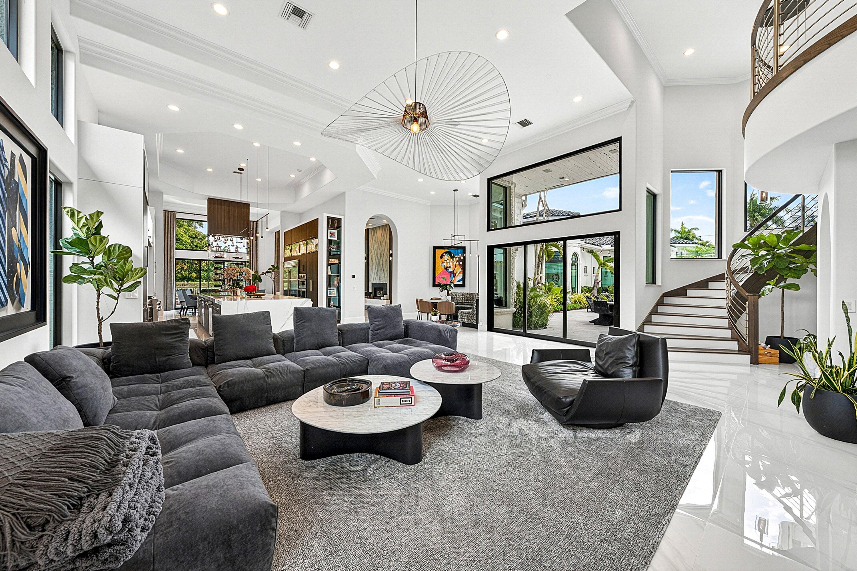 3633 Carlton Place Boca Raton, FL 33496 - Photo 22 of 99 a living room with furniture potted plant and a large window