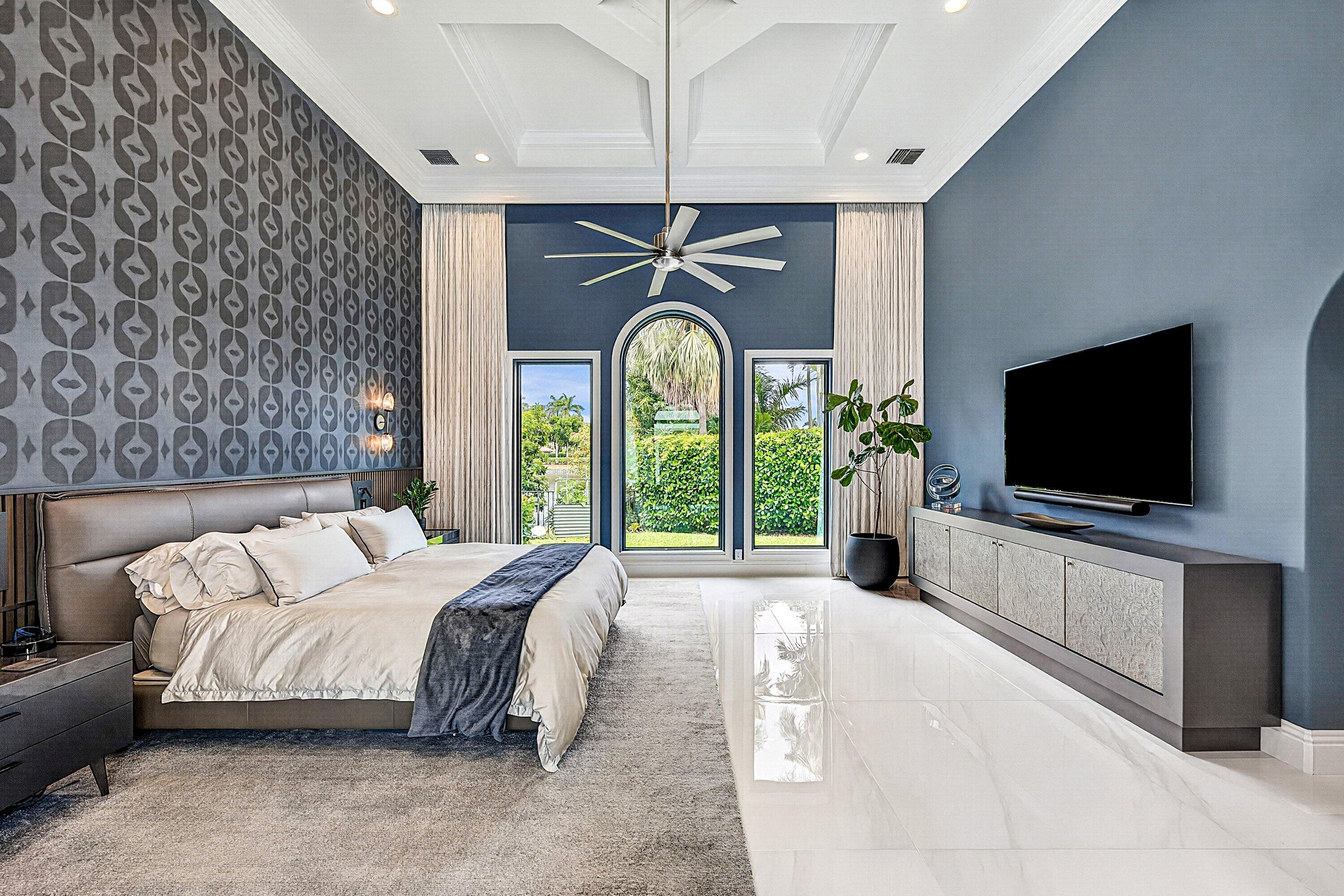 3633 Carlton Place Boca Raton, FL 33496 - Photo 36 of 99 a spacious bedroom with a bed and a flat screen tv