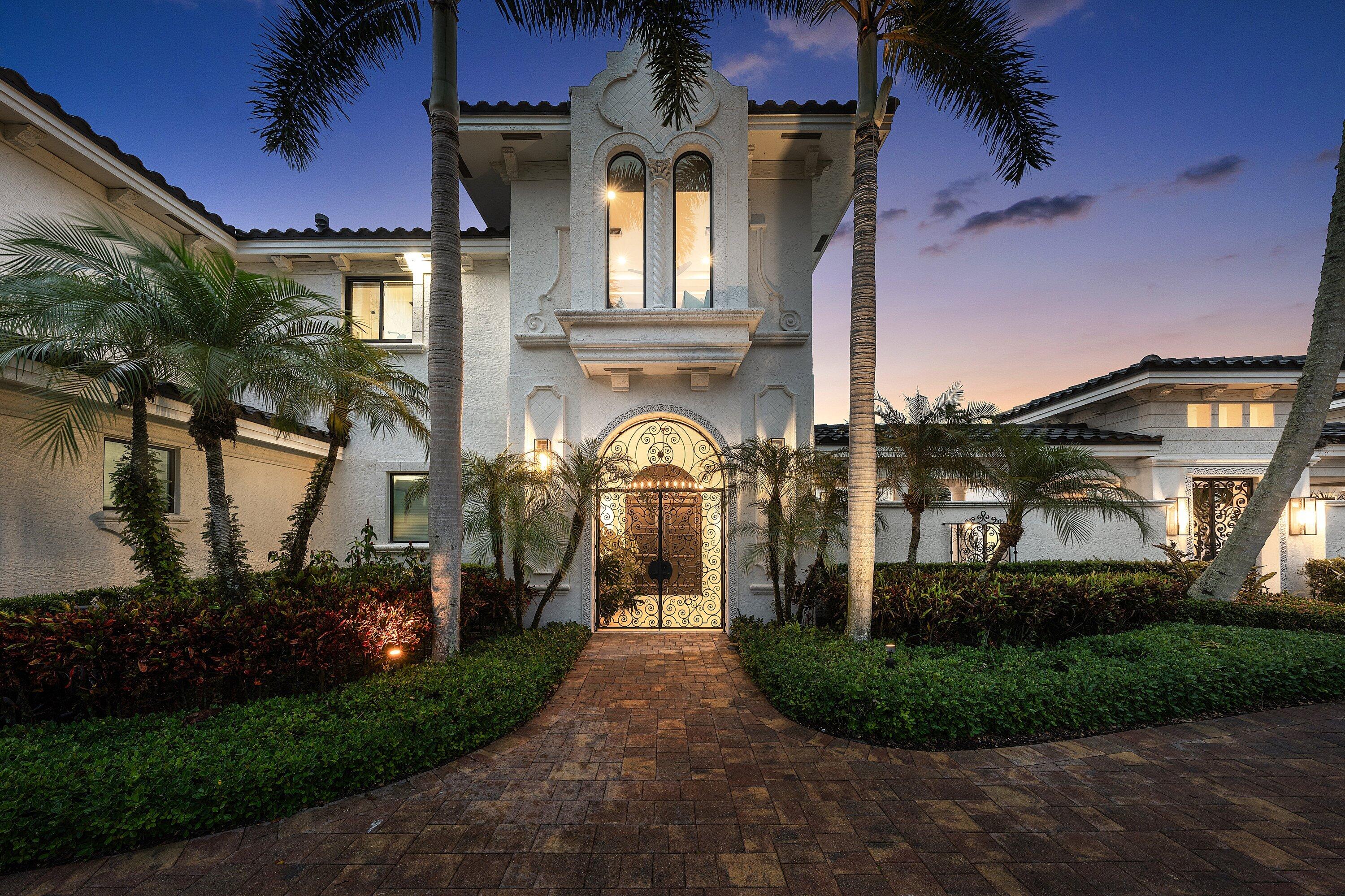 3633 Carlton Place Boca Raton, FL 33496 - Photo 4 of 99 front view of a house with a garden