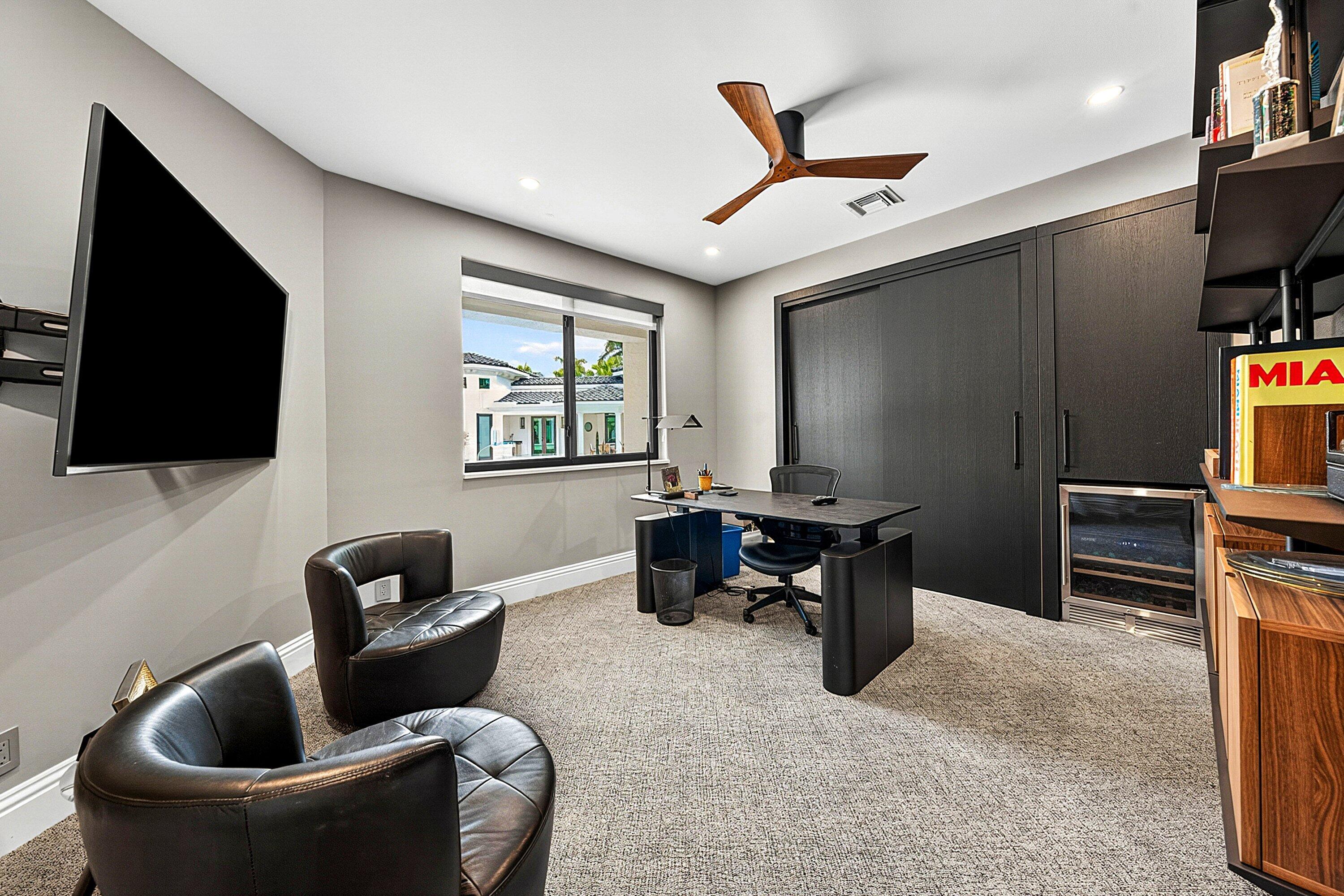 3633 Carlton Place Boca Raton, FL 33496 - Photo 49 of 99 a living room with furniture and a flat screen tv