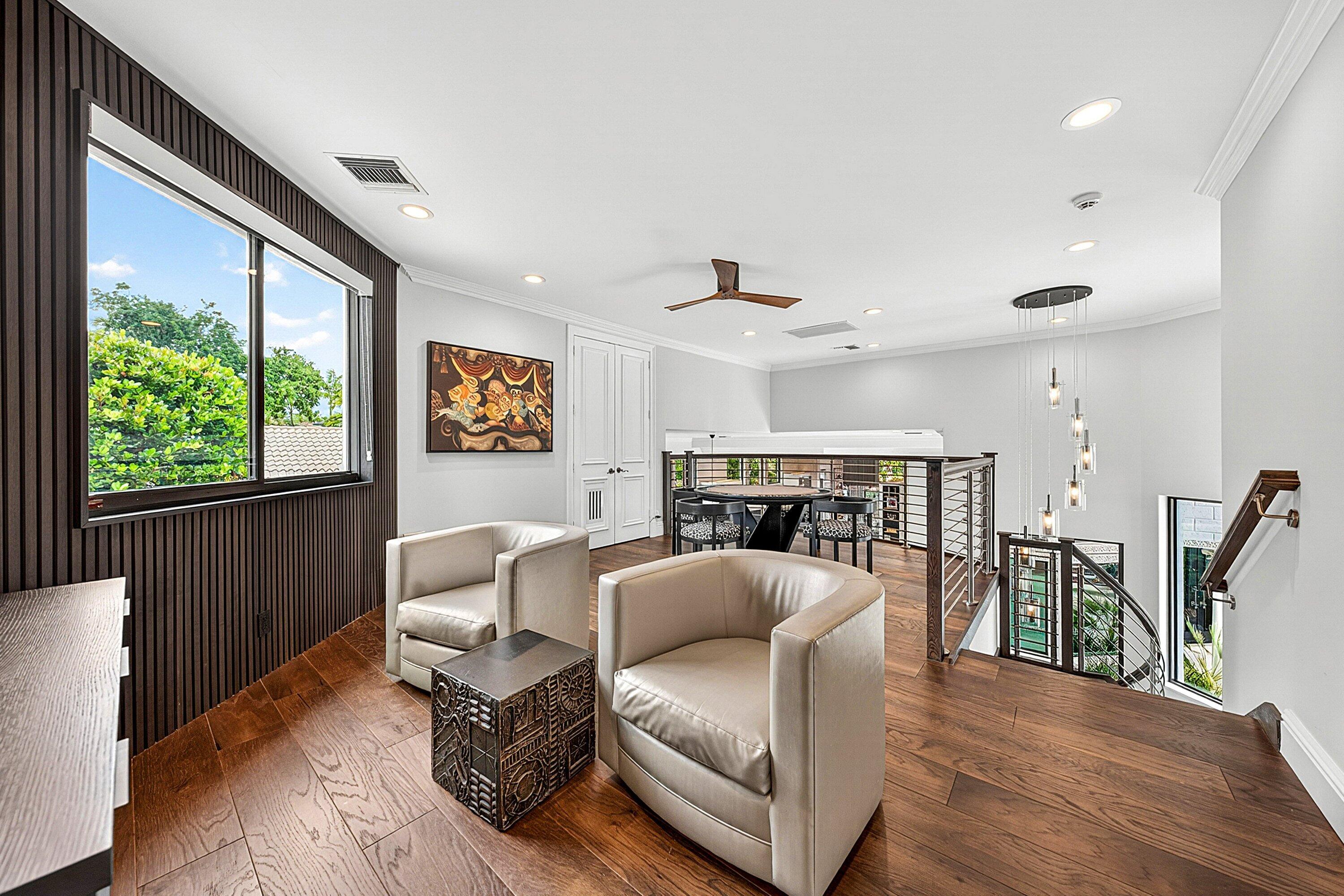 3633 Carlton Place Boca Raton, FL 33496 - Photo 56 of 99 a living room with furniture and wooden floor