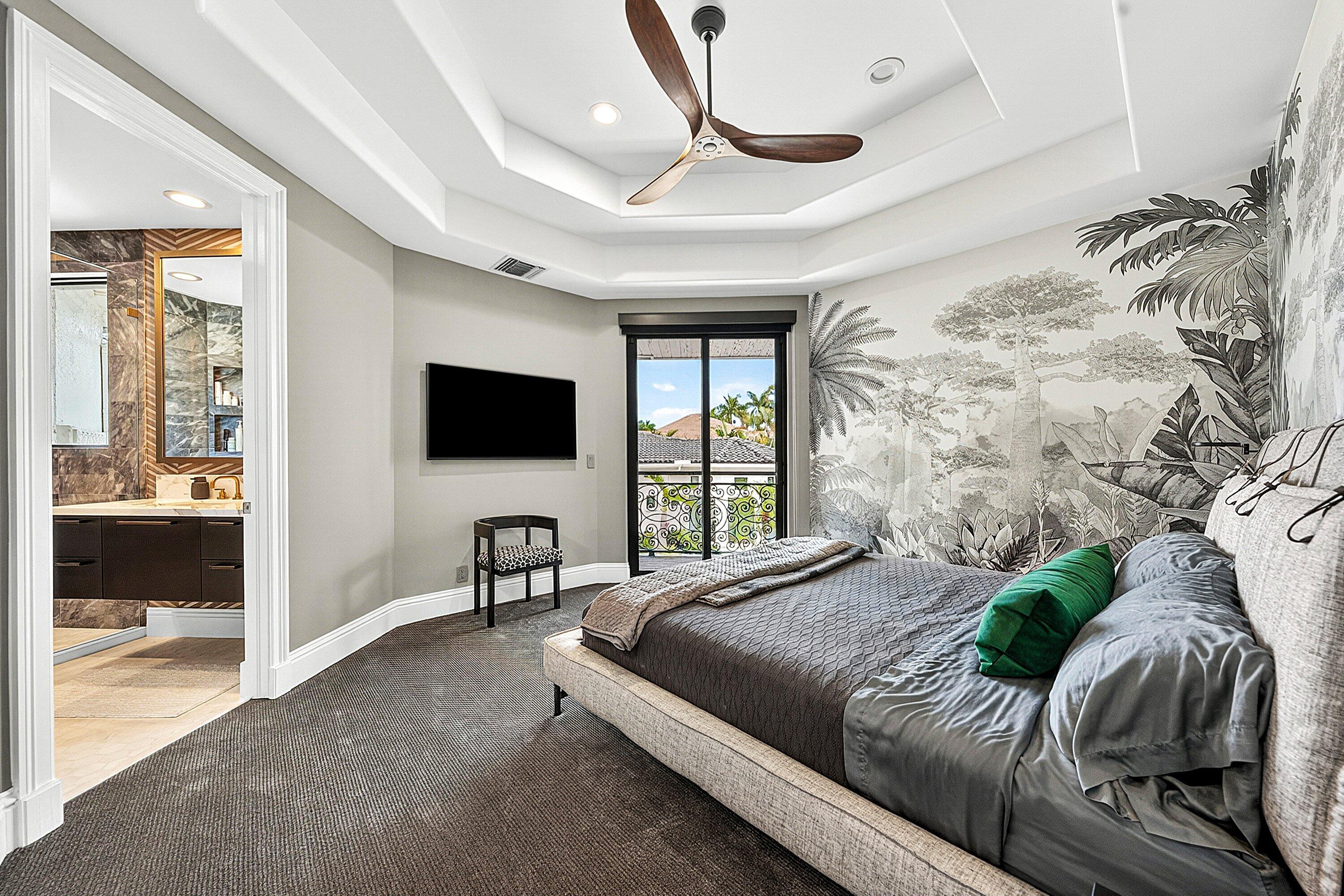 3633 Carlton Place Boca Raton, FL 33496 - Photo 60 of 99 a bedroom with a bed and a flat tv screen on the dresser