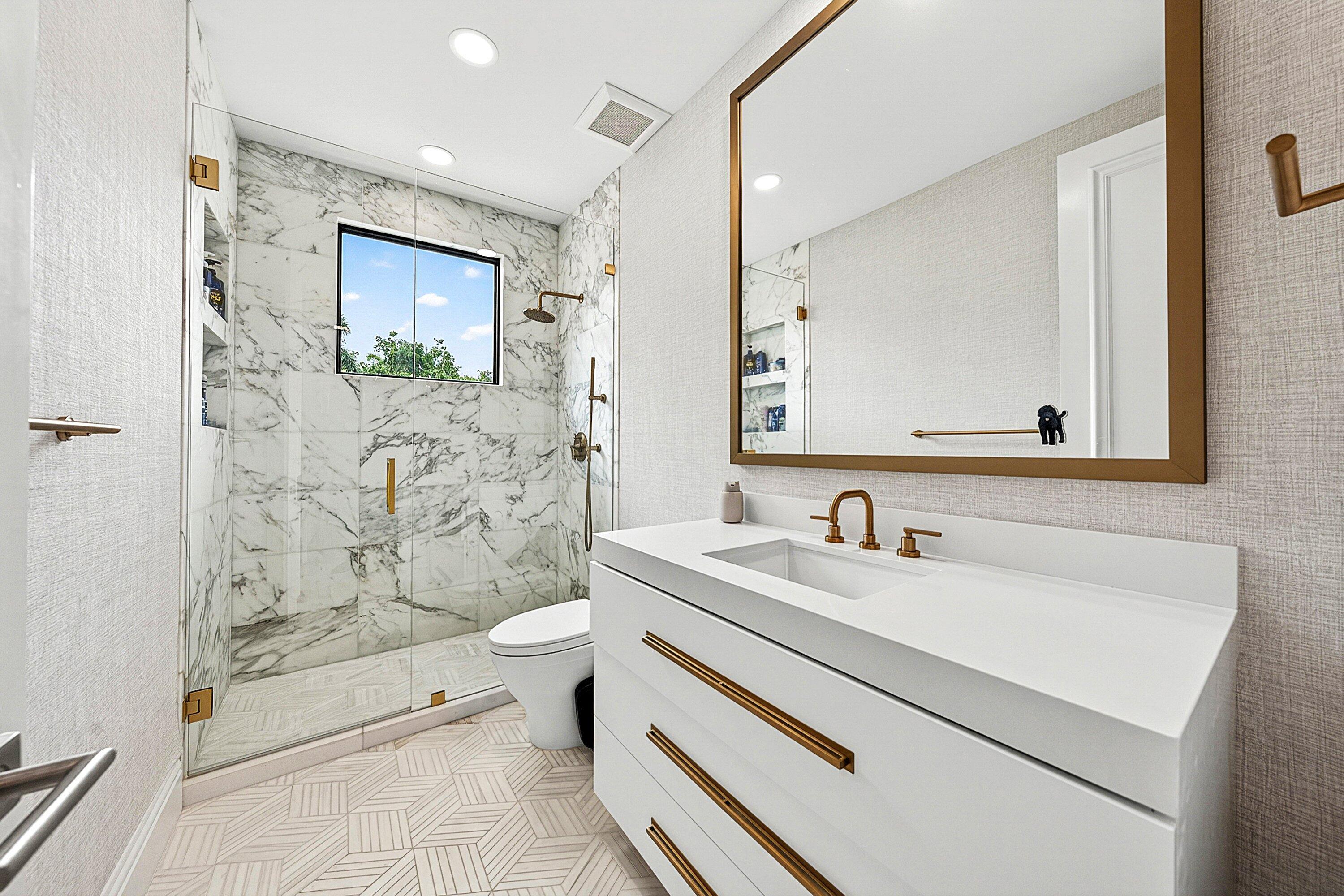 3633 Carlton Place Boca Raton, FL 33496 - Photo 64 of 99 a bathroom with a sink a toilet and shower