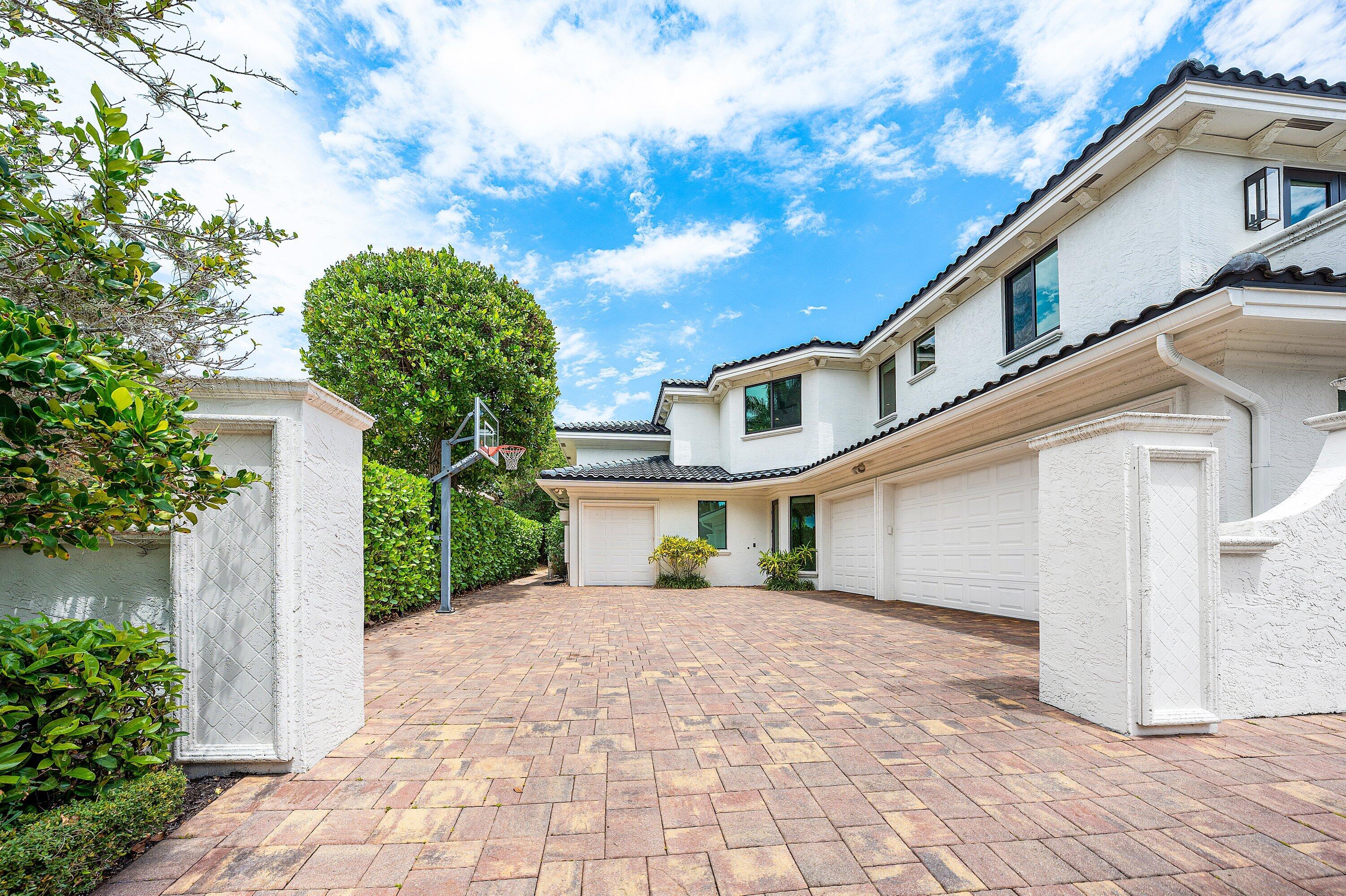 3633 Carlton Place Boca Raton, FL 33496 - Photo 80 of 99 a front view of a house with garden