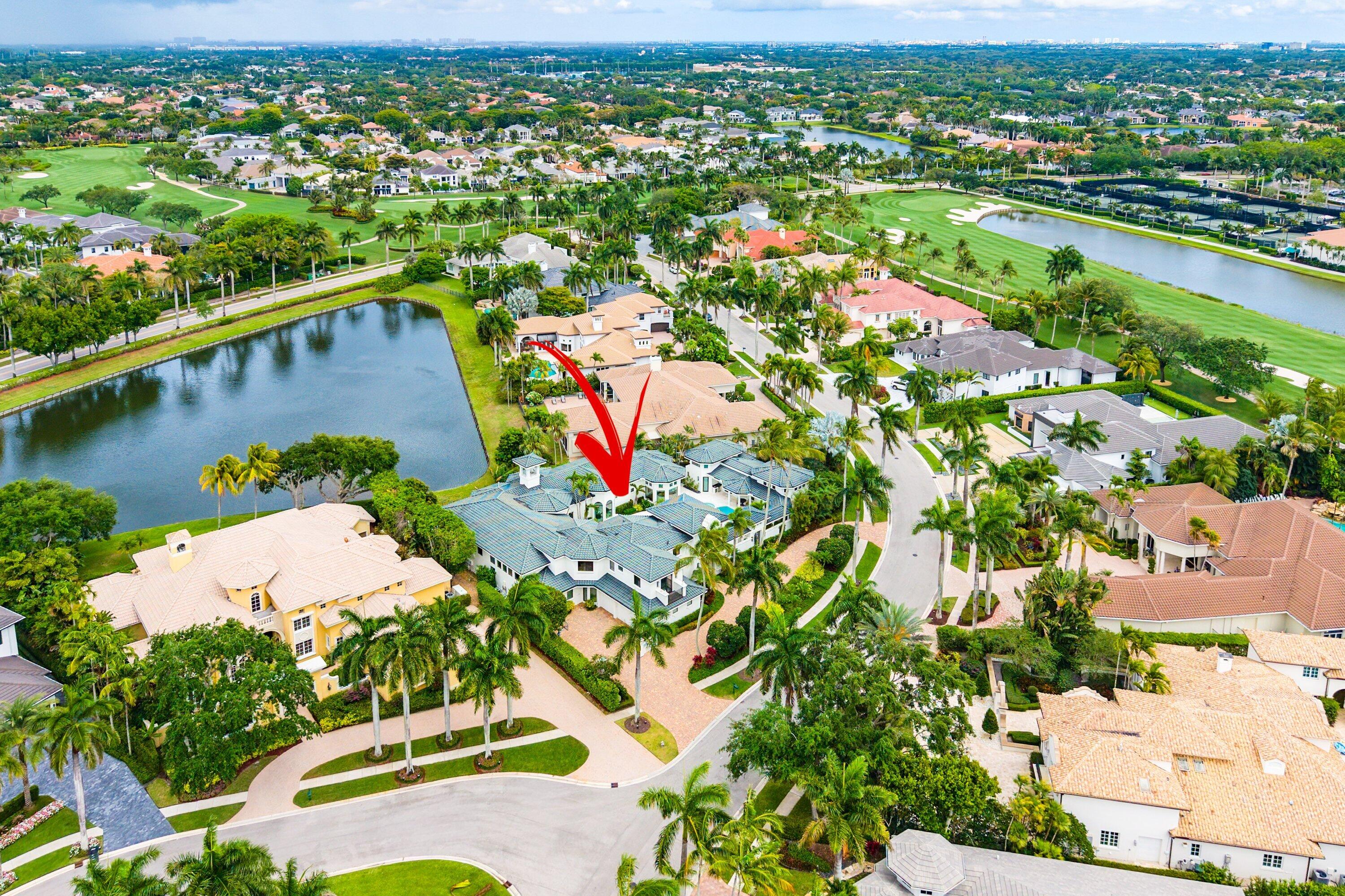 3633 Carlton Place Boca Raton, FL 33496 - Photo 88 of 99 an aerial view of a city with lots of residential buildings ocean and mountain view in back