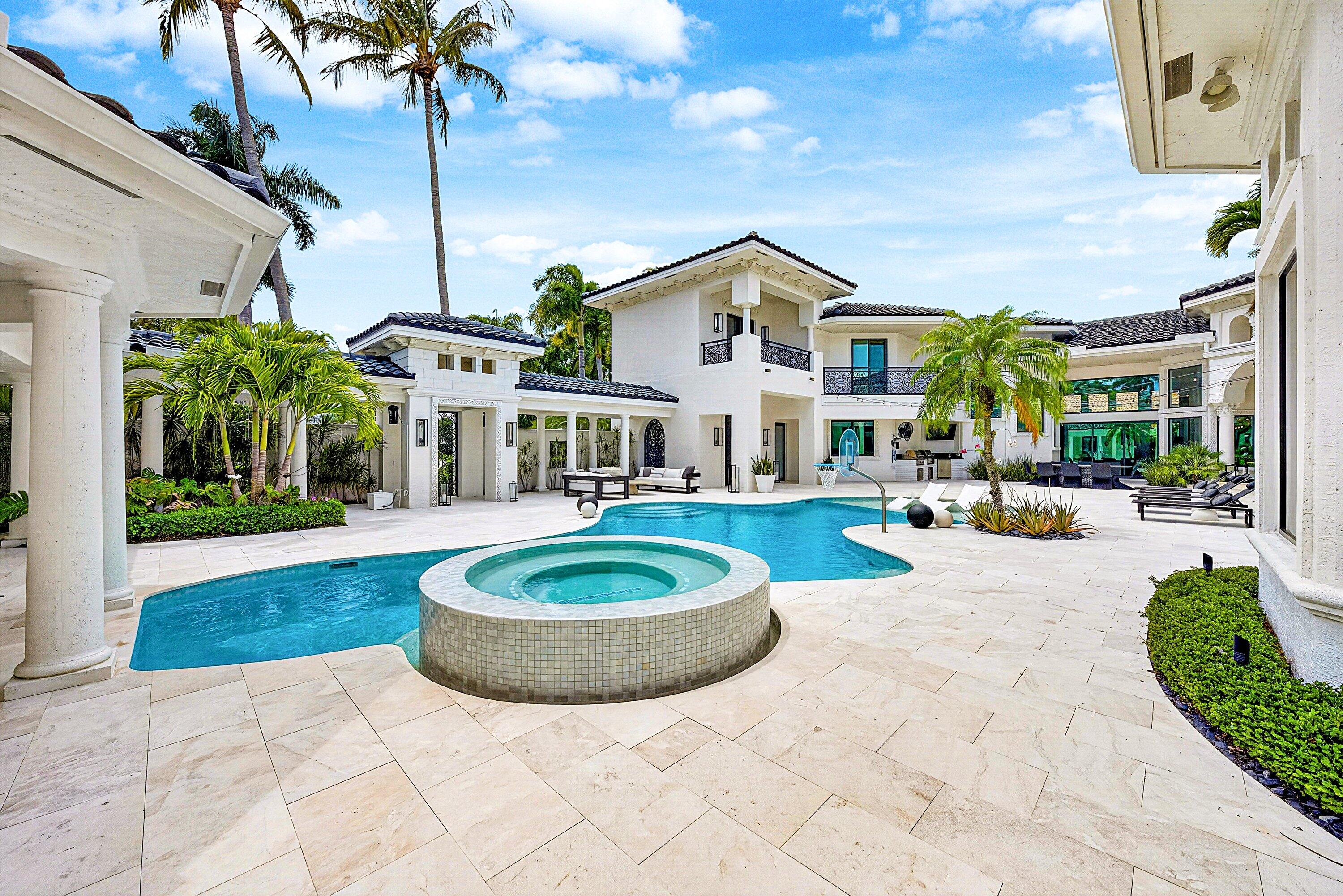 3633 Carlton Place Boca Raton, FL 33496 - Photo 9 of 99 a view of a house with swimming pool and a fire pit