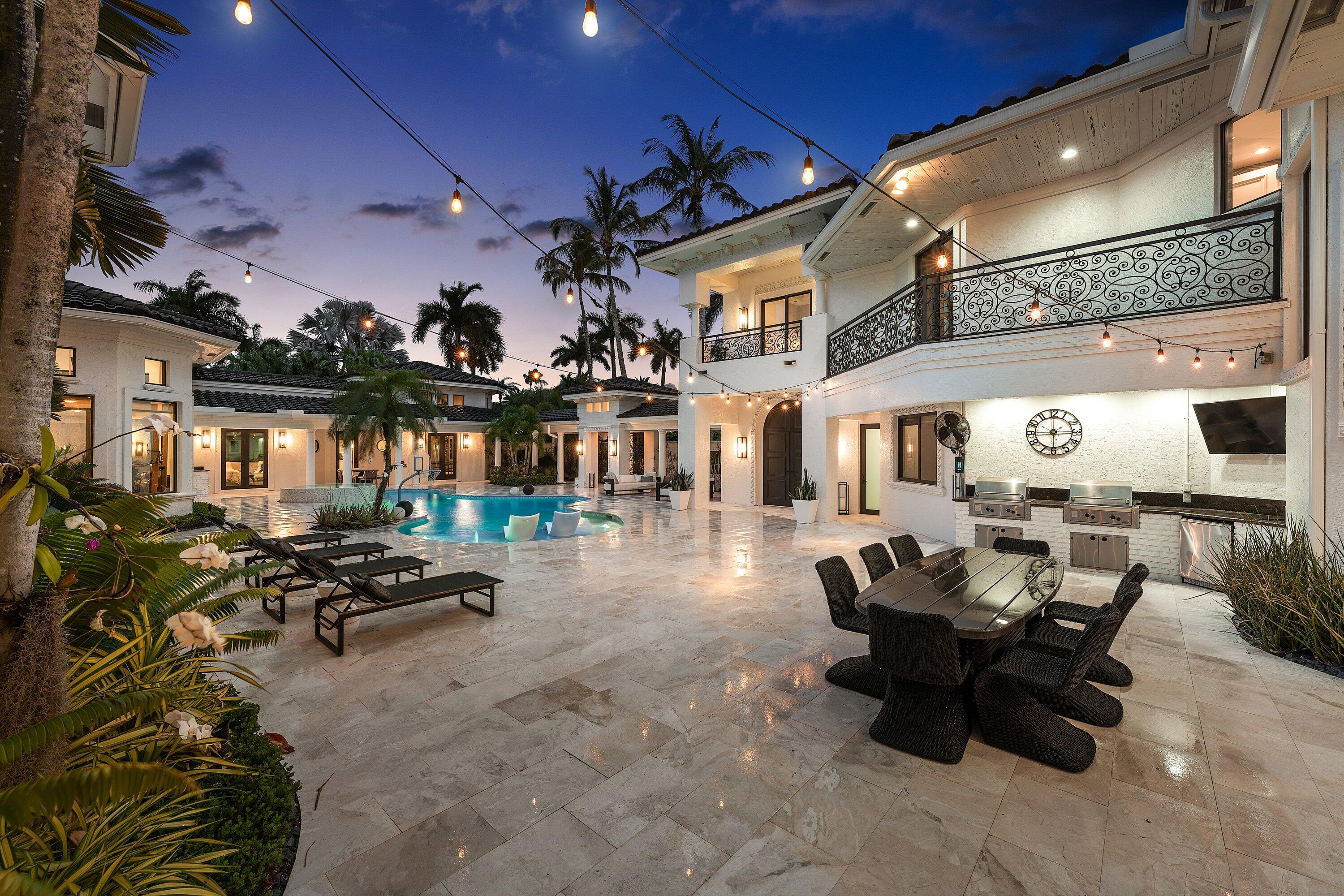 3633 Carlton Place Boca Raton, FL 33496 - Photo 94 of 99 a building outdoor space with patio furniture and potted plants