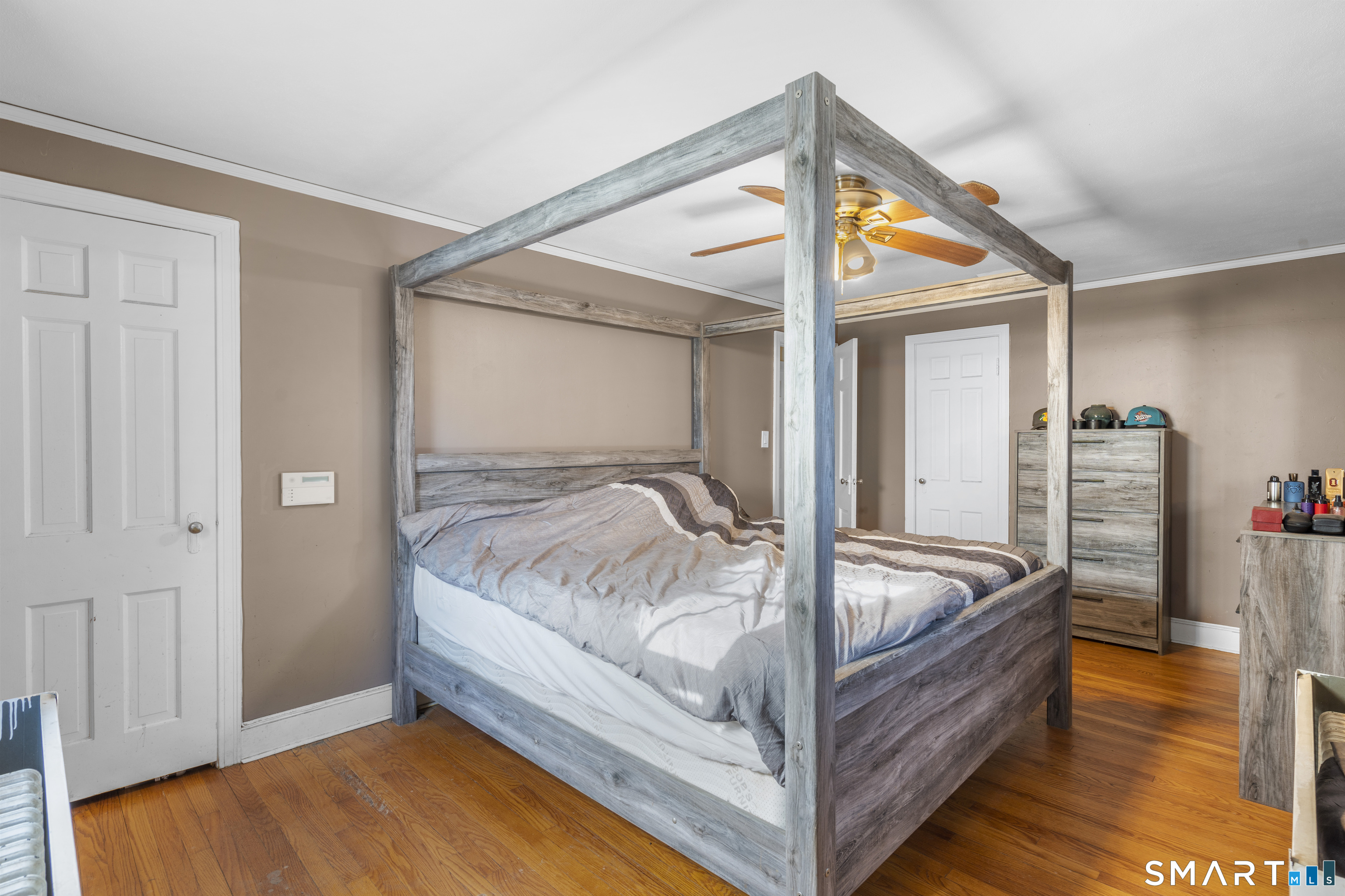 168 Hubbard Road Hartford, CT 06114 - Photo 16 of 27 a bed room with a bed and a window