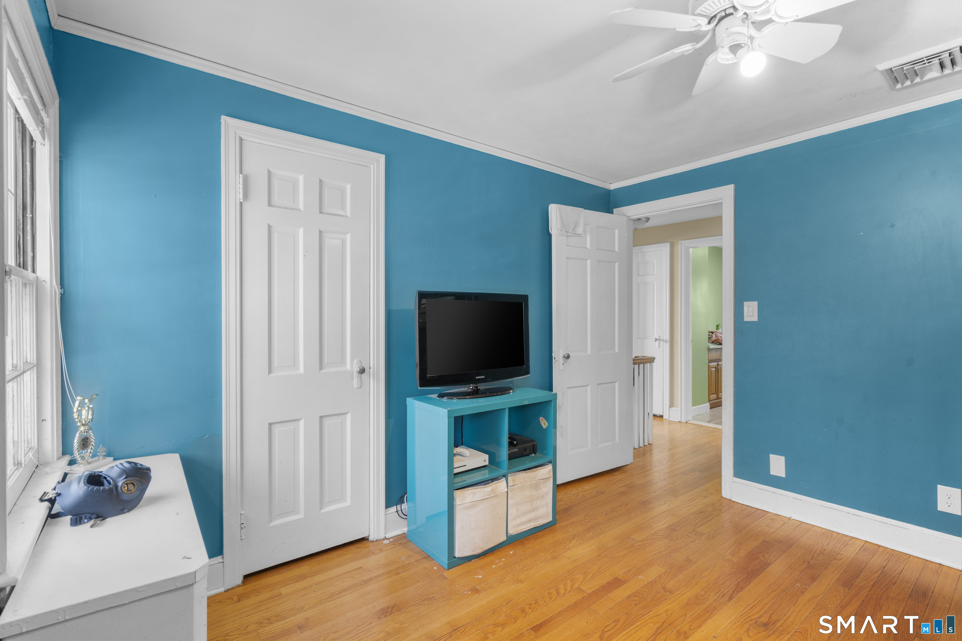 168 Hubbard Road Hartford, CT 06114 - Photo 18 of 27 a living room with furniture and a flat screen tv