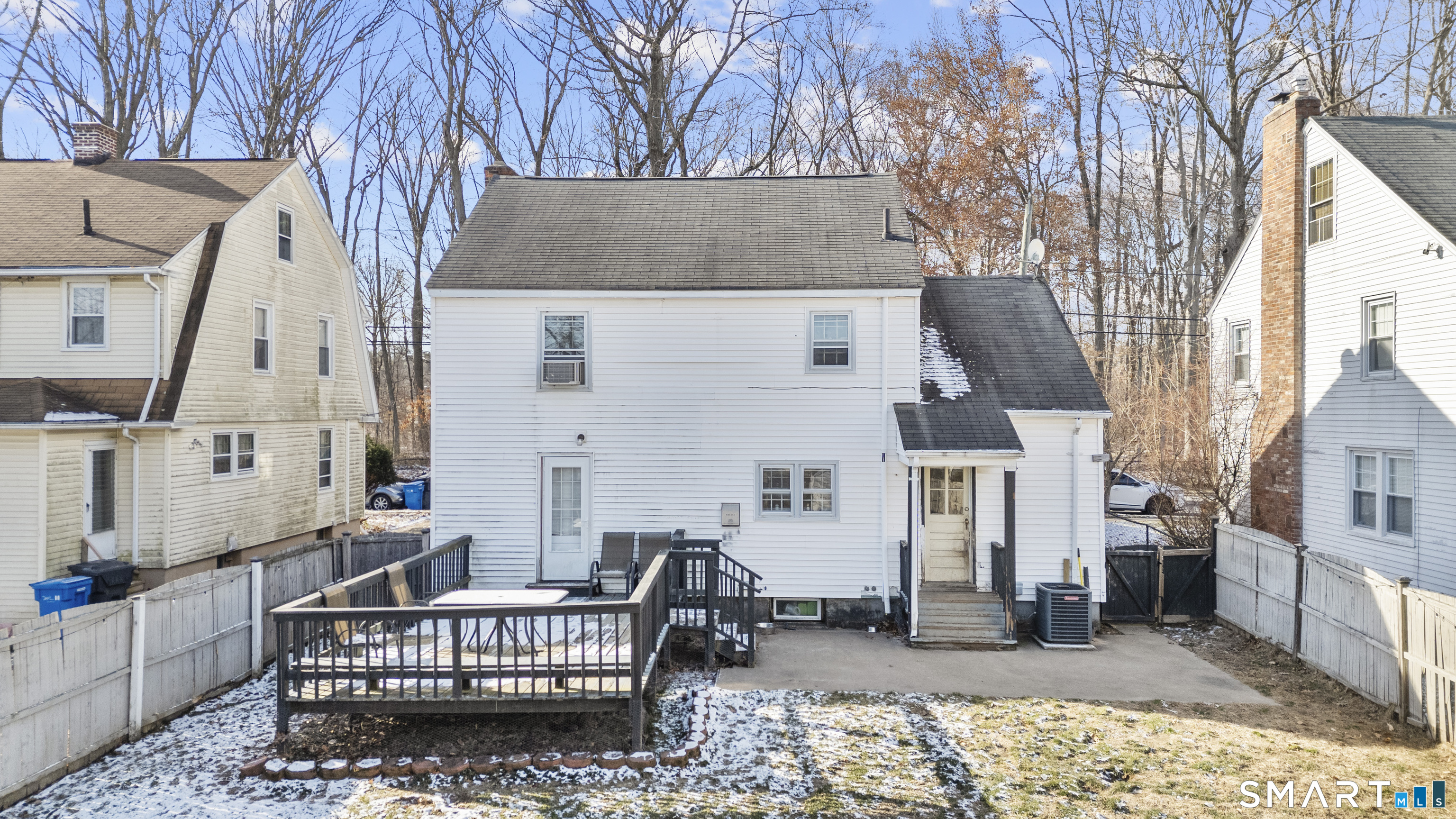 168 Hubbard Road Hartford, CT 06114 - Photo 26 of 27 a view of a house with wooden fence and sitting area
