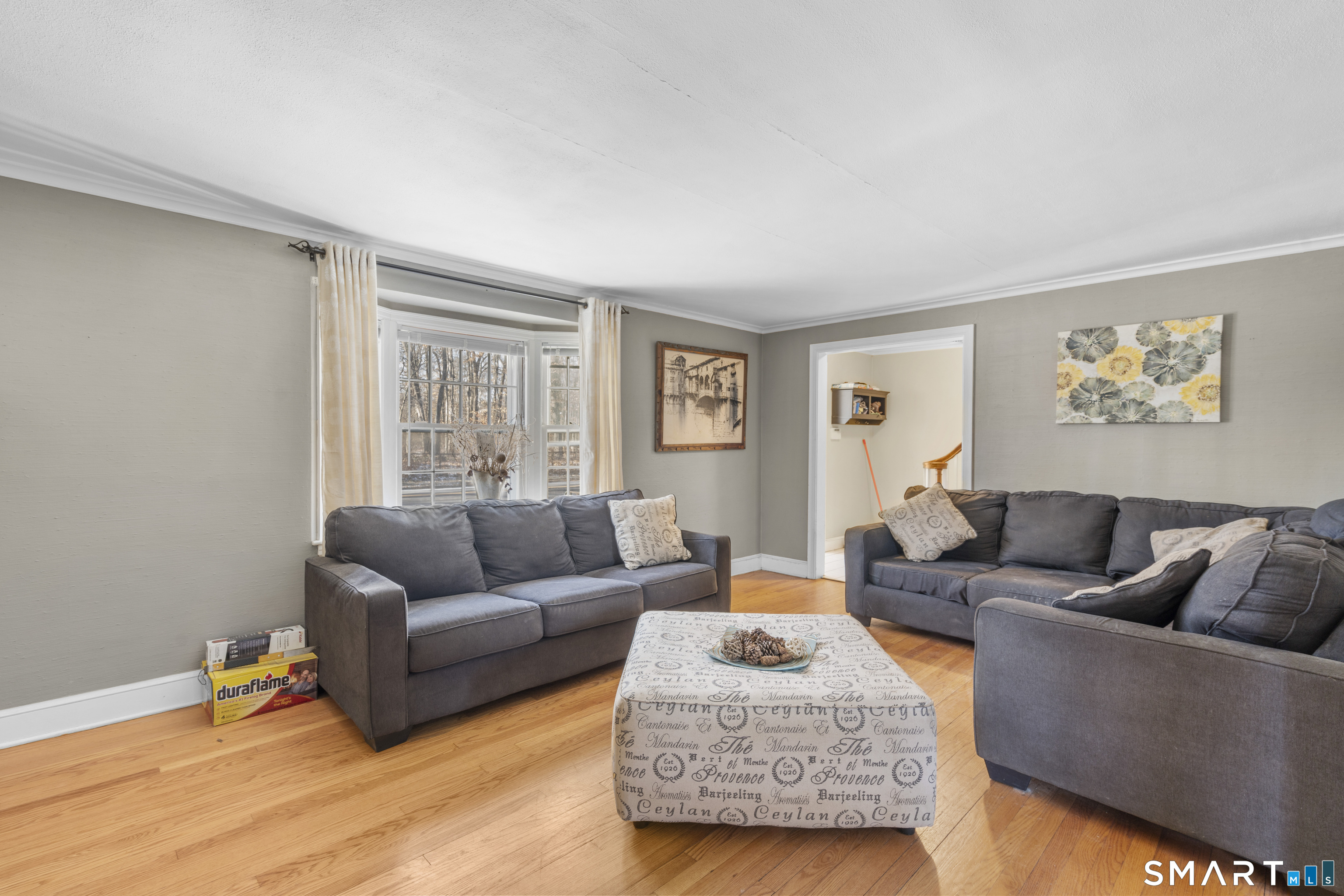 168 Hubbard Road Hartford, CT 06114 - Photo 5 of 27 a living room with furniture and a window