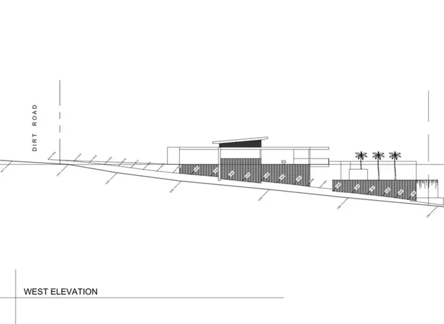 a view of a road with an ocean view