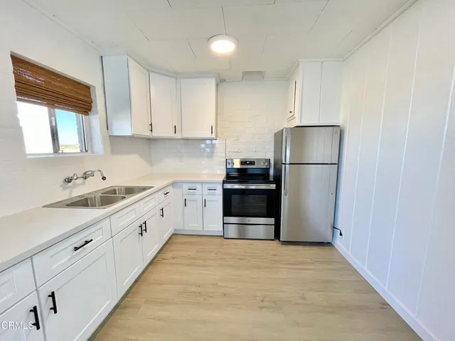 a bathroom with a shower and a toilet