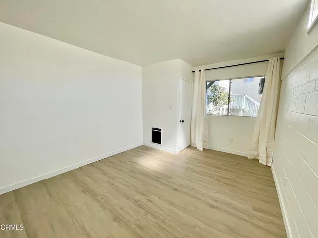 a view of a glass door with an outdoor space