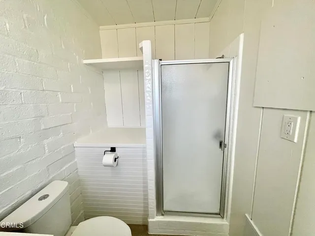 a view of empty room with windows