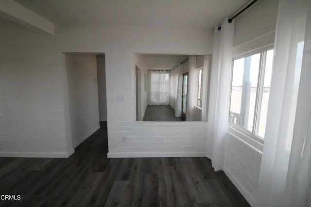 a front view of a house with seating space