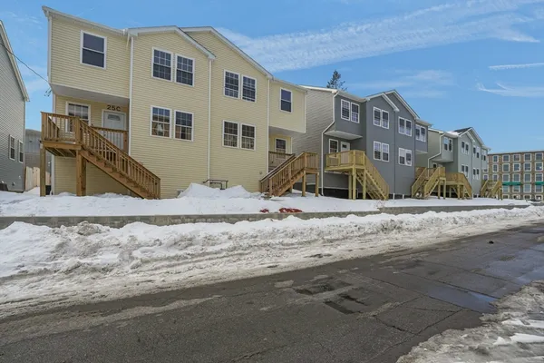 a view of a house with snow