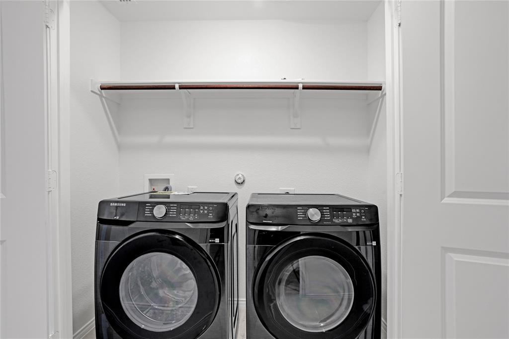 14048 Earlham Street Pilot Point, TX 76258 - Photo 13 of 15 a utility room with dryer and washer